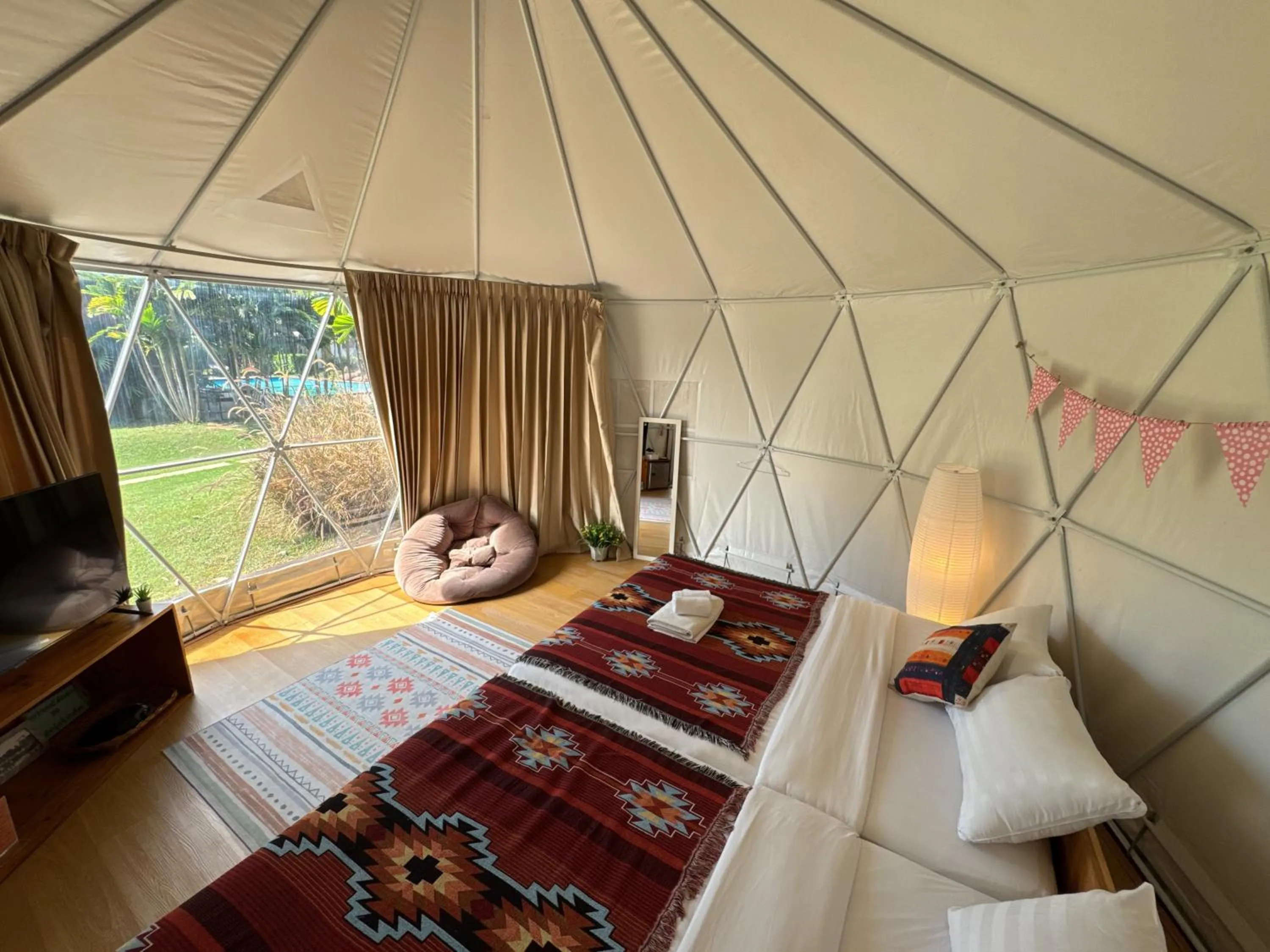 Bed in The Campster Kanchanaburi