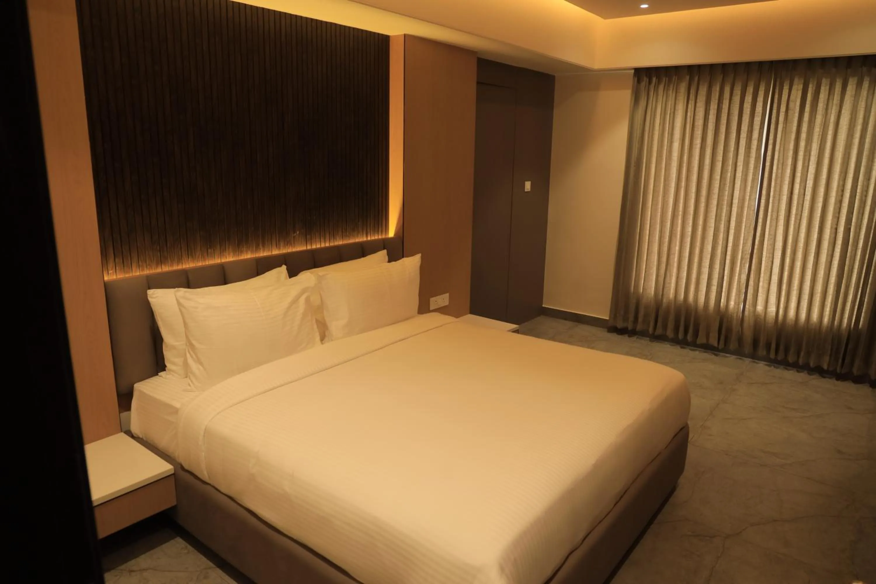 Bed in VANTARA SUITEs