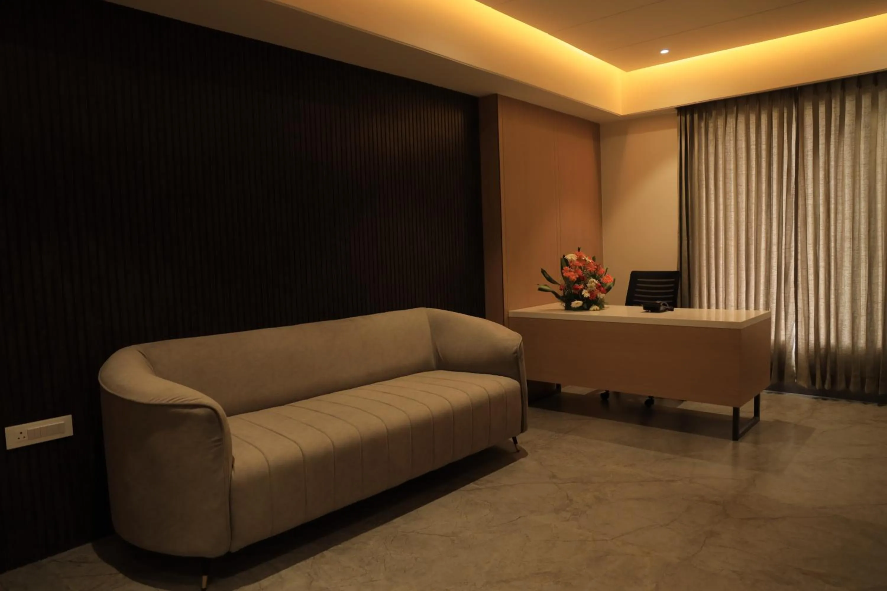 Living room in VANTARA SUITEs