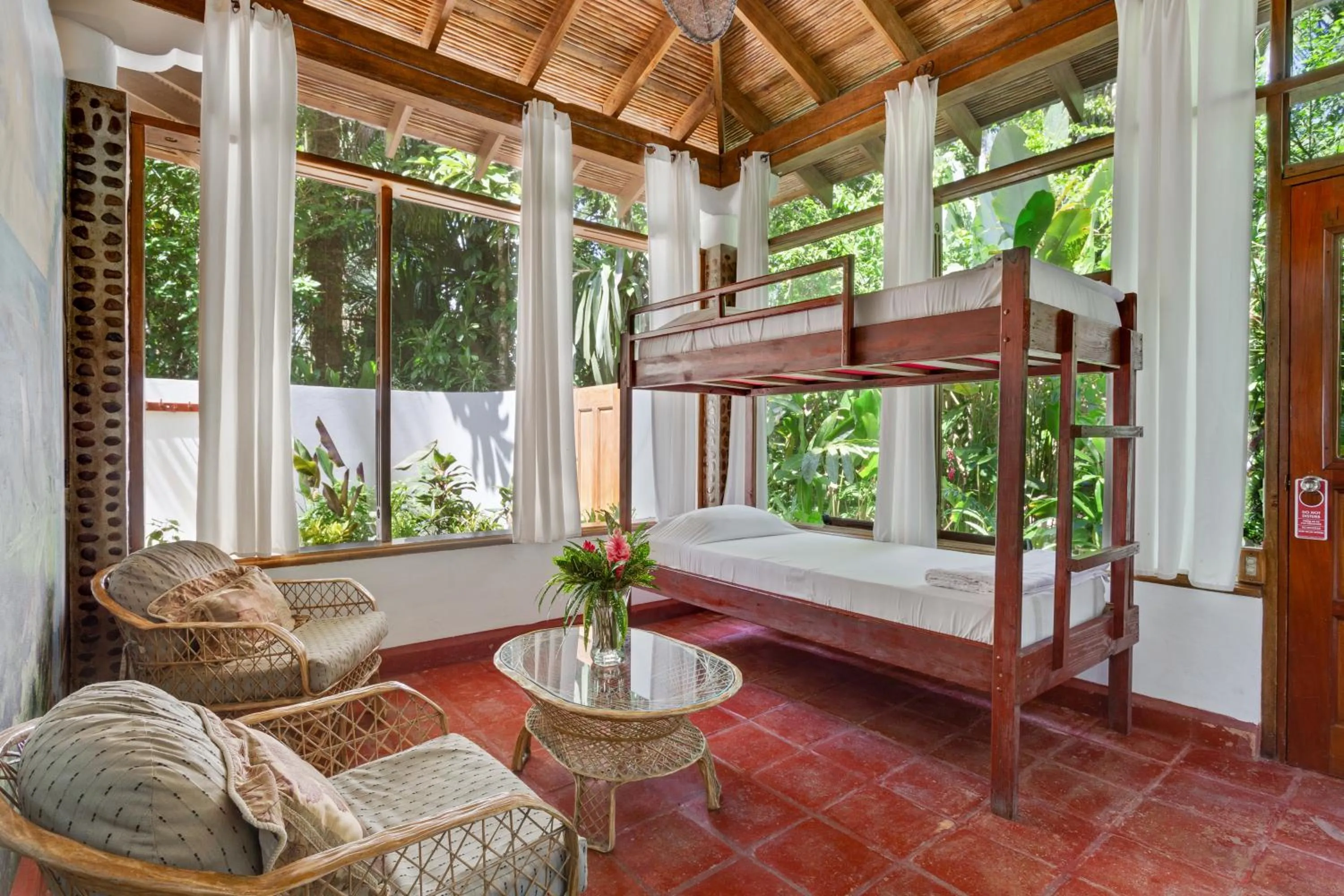 Bed in Ian Anderson Caves Branch Jungle Lodge