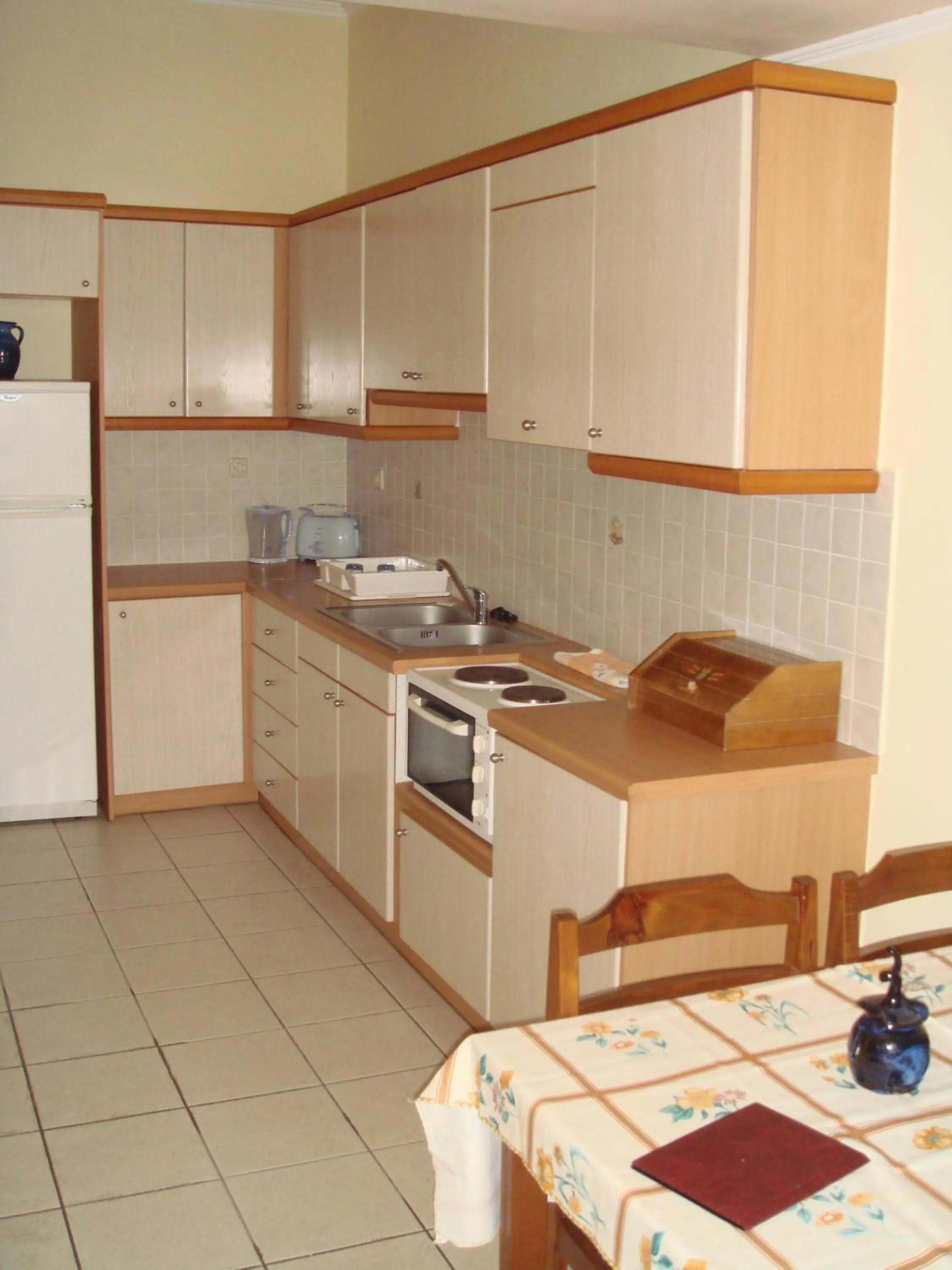 Kitchen or kitchenette in Aloni Suites