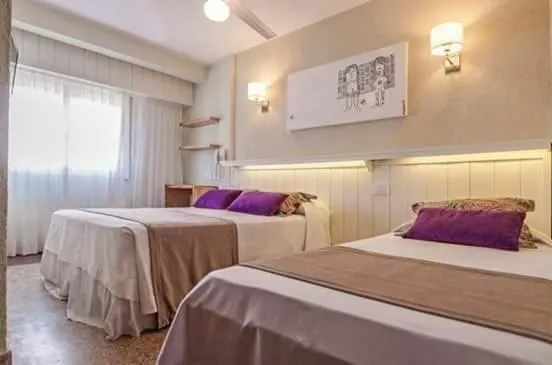 Bed in Romina Art Hotel