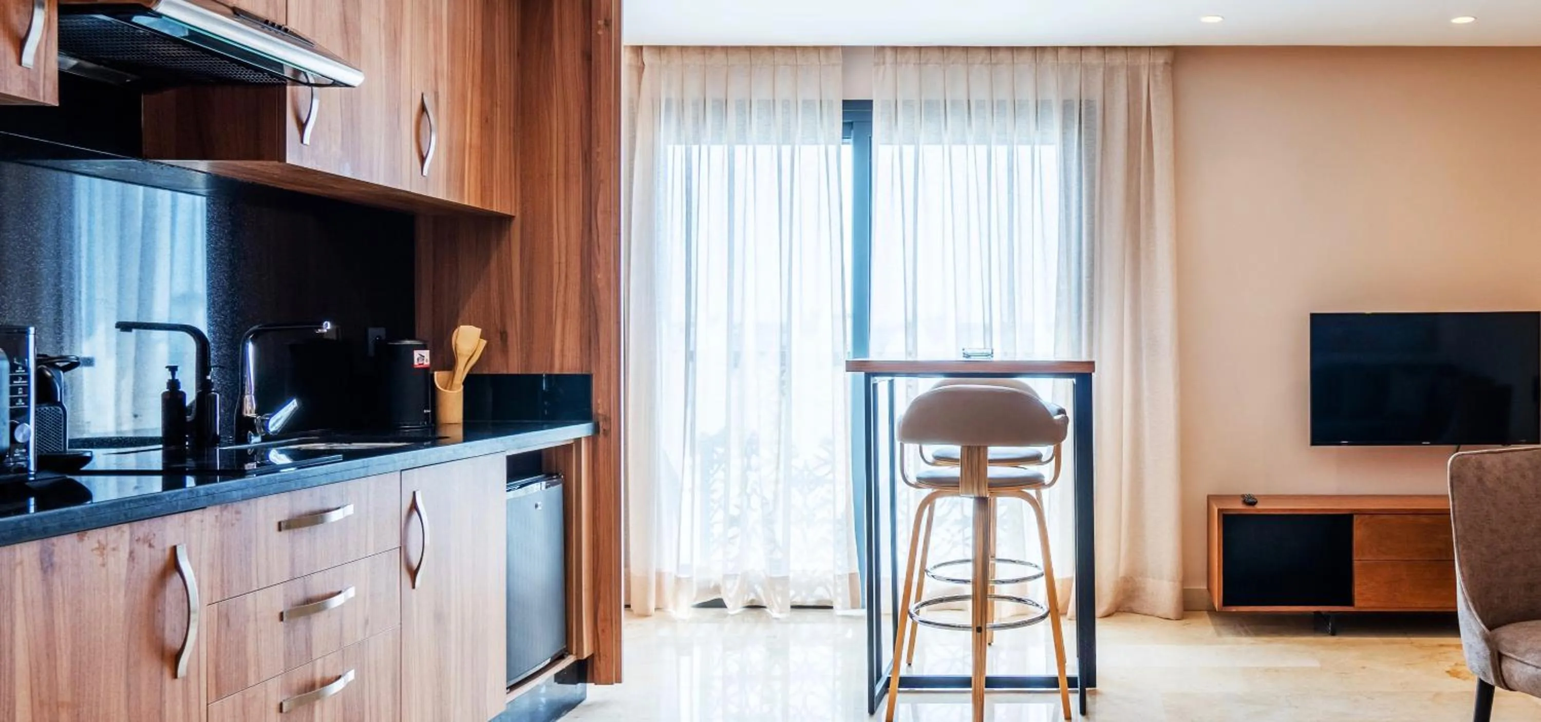 Communal lounge/ TV room in AS Premium By Soho Hotels Maarif