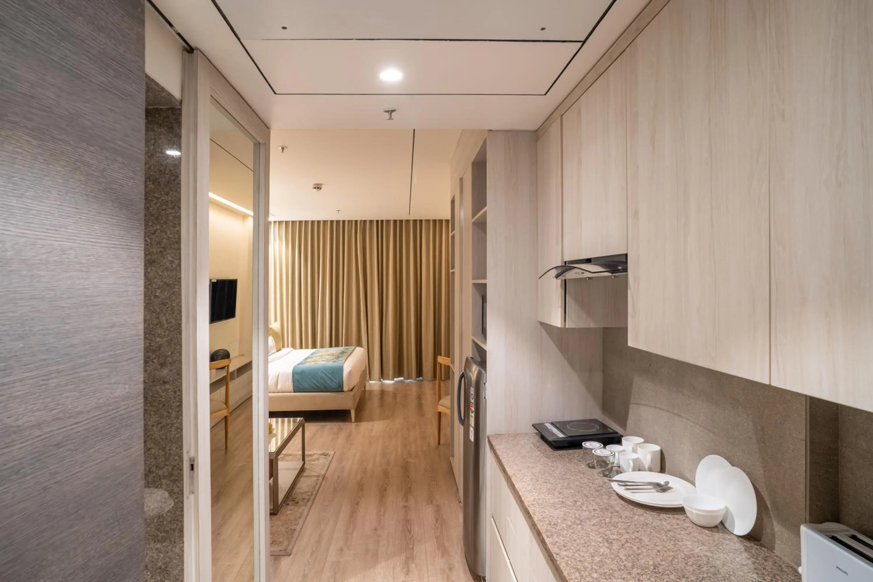 Bedroom, Bed in jüSTa Residences - AIPL Joy Street, Gurgaon