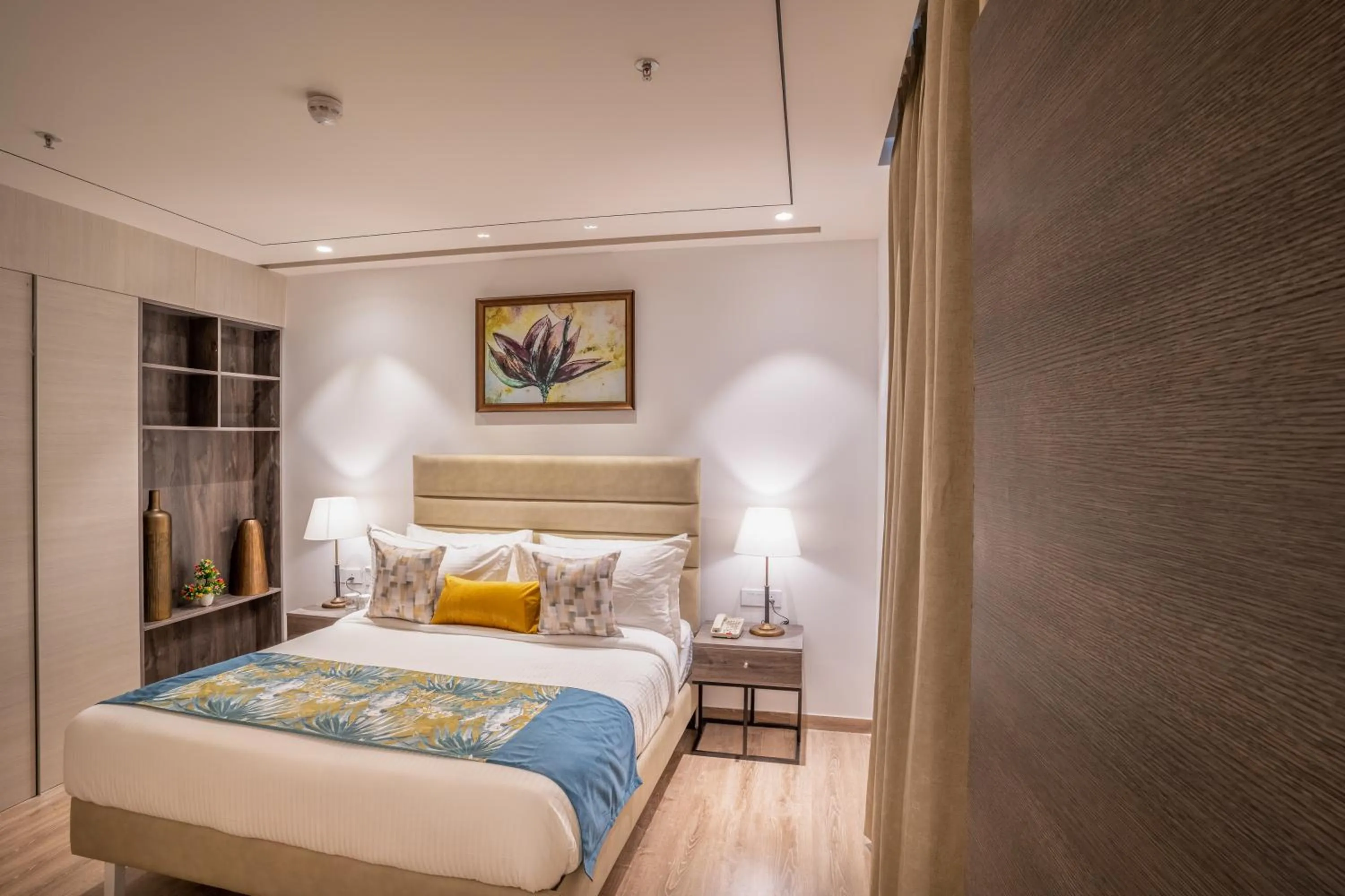 Bedroom, Bed in jüSTa Residences - AIPL Joy Street, Gurgaon