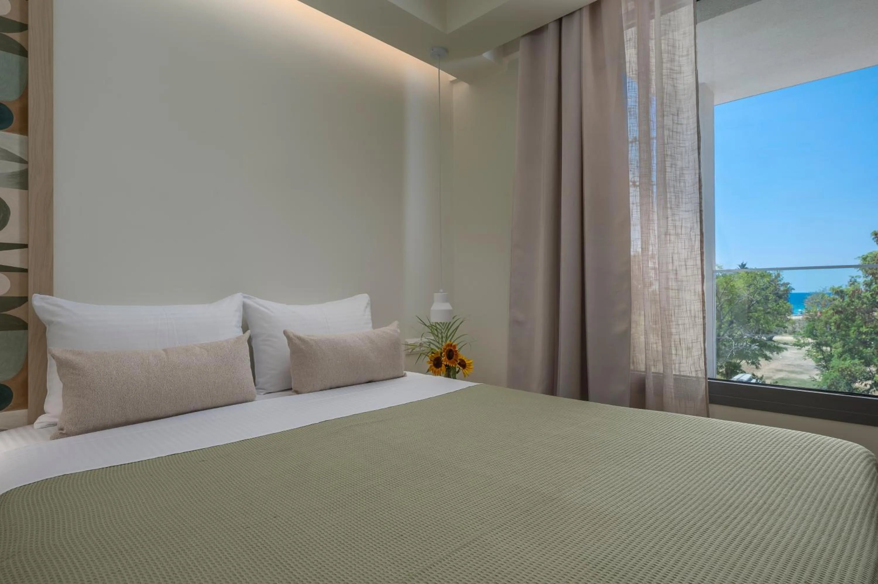 Bed in Sandy Seaside Suites