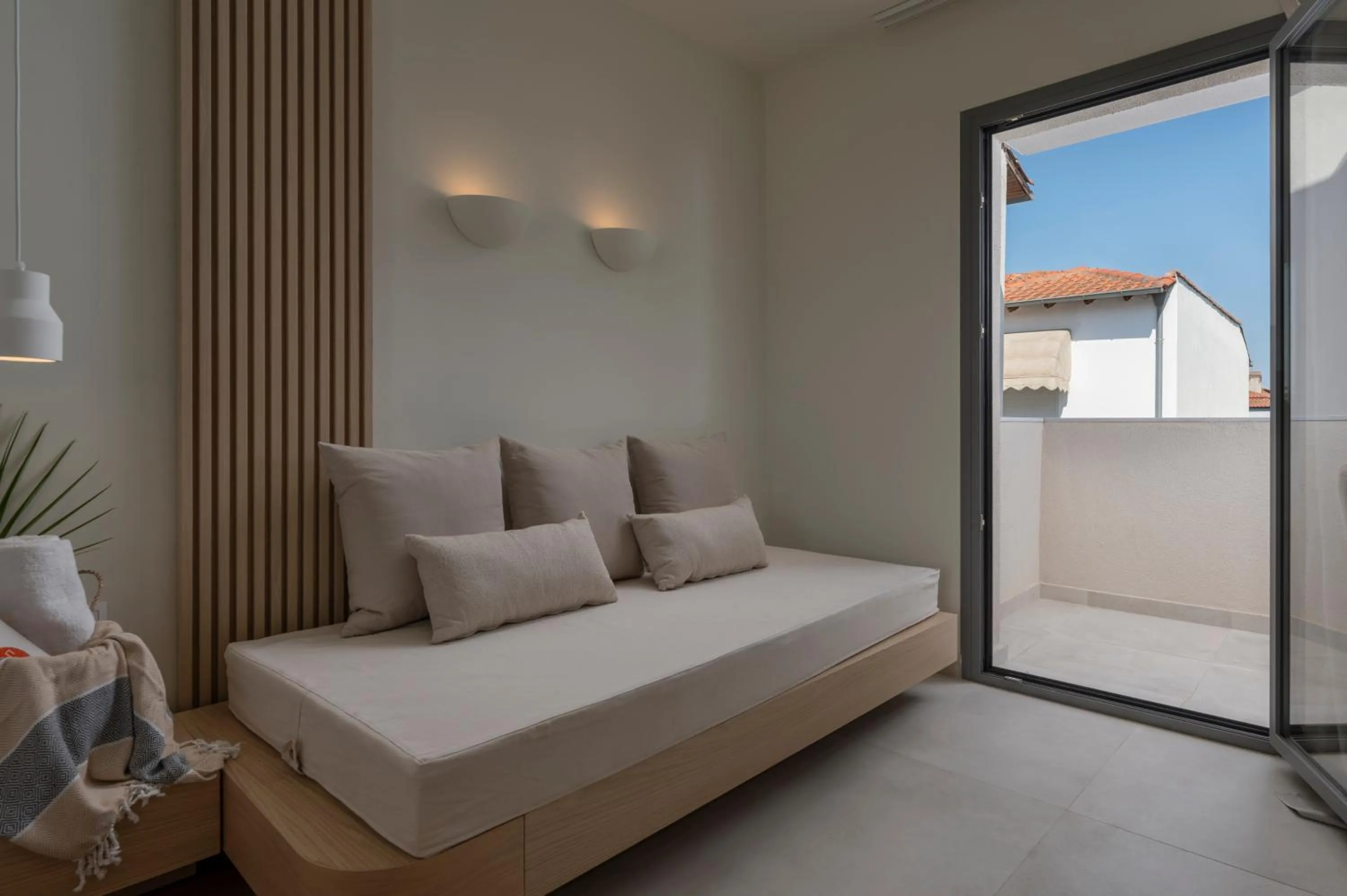 Bed in Sandy Seaside Suites