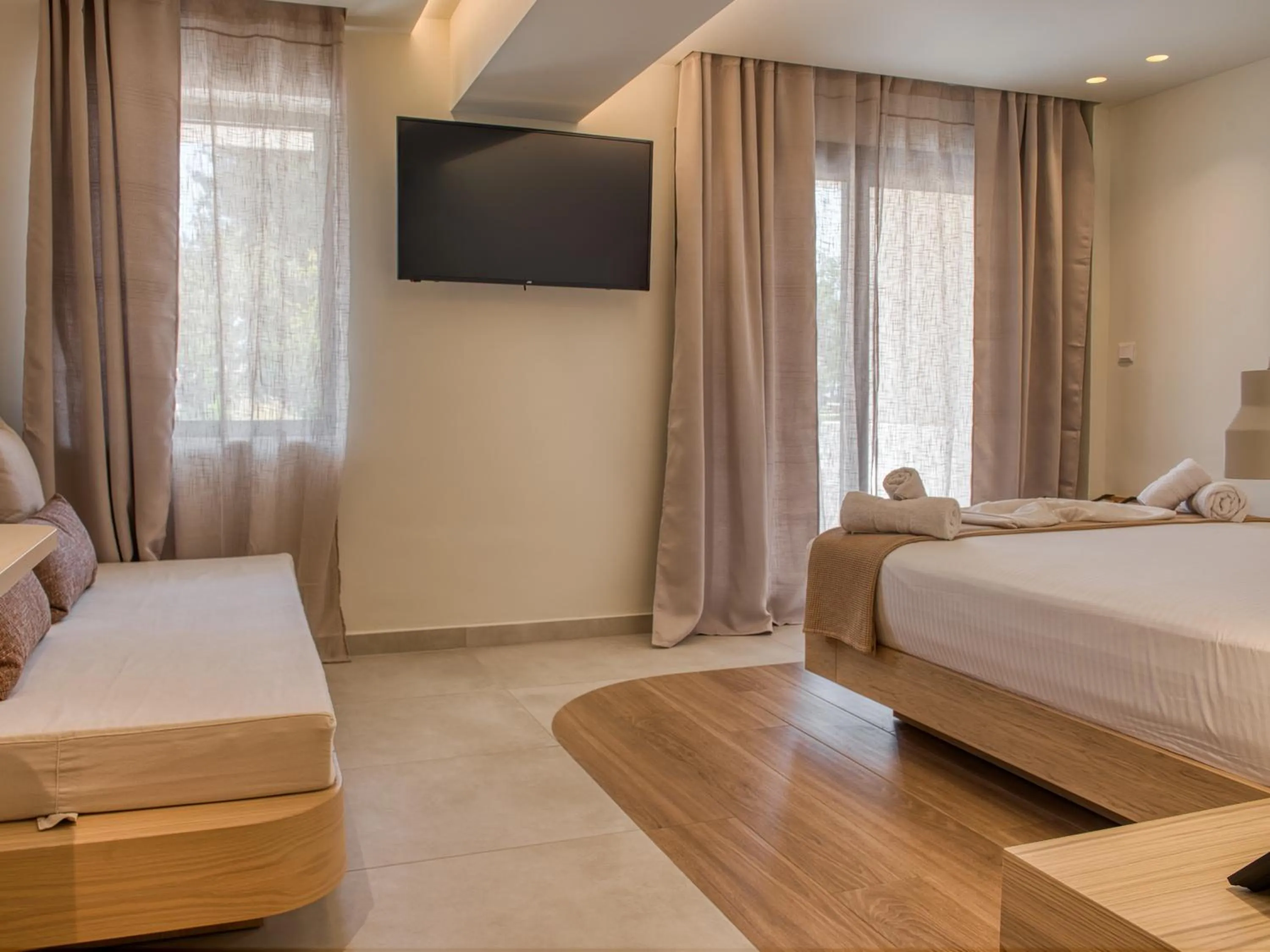 Photo of the whole room, Bed in Sandy Seaside Suites