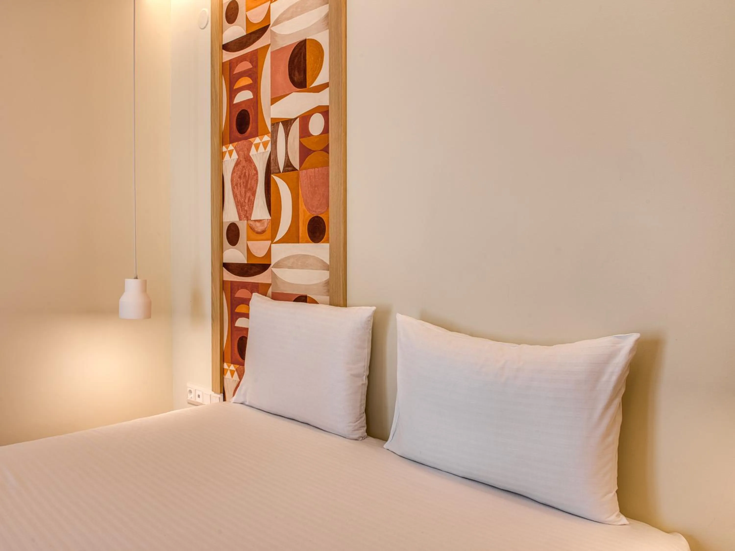 Bed in Sandy Seaside Suites