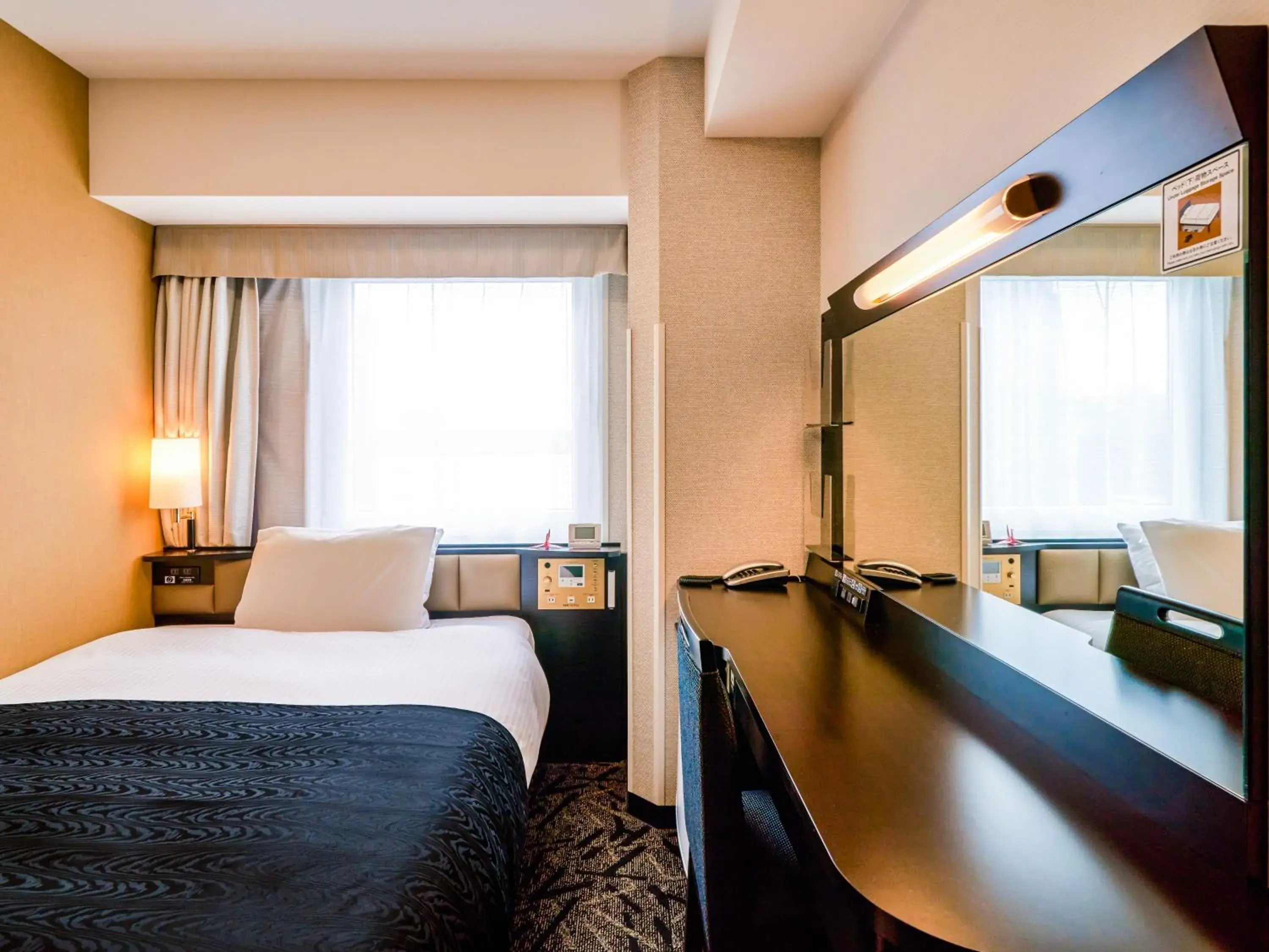 Photo of the whole room, Bed in APA Hotel Hiroshima Ekimae Shinkansenguchi Photo of the whole room, Bed in APA Hotel Hiroshima Ekimae Shinkansenguchi