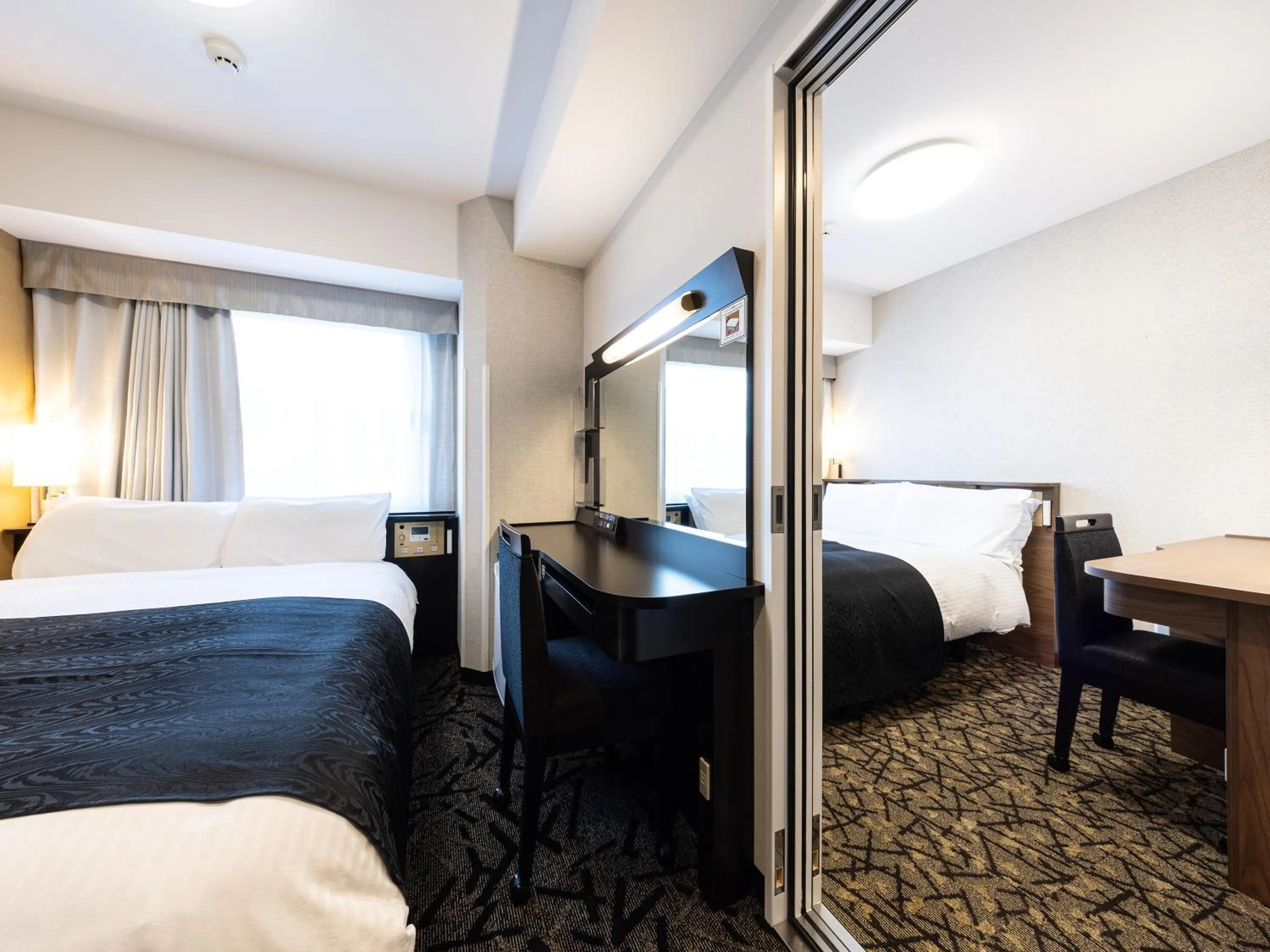 Photo of the whole room, Bed in APA Hotel Hiroshima Ekimae Shinkansenguchi