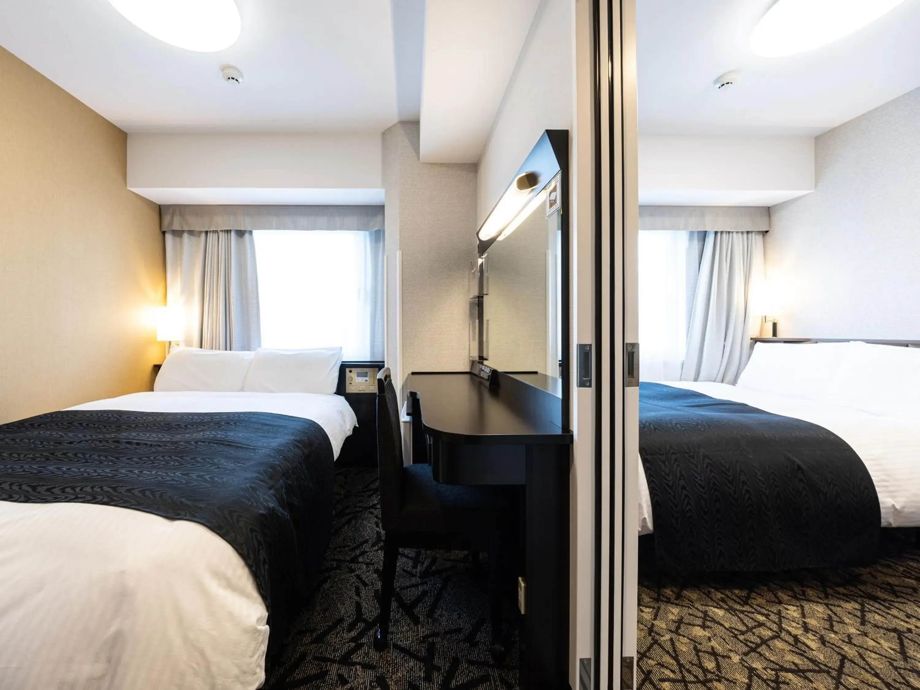 Photo of the whole room, Bed in APA Hotel Hiroshima Ekimae Shinkansenguchi Photo of the whole room, Bed in APA Hotel Hiroshima Ekimae Shinkansenguchi