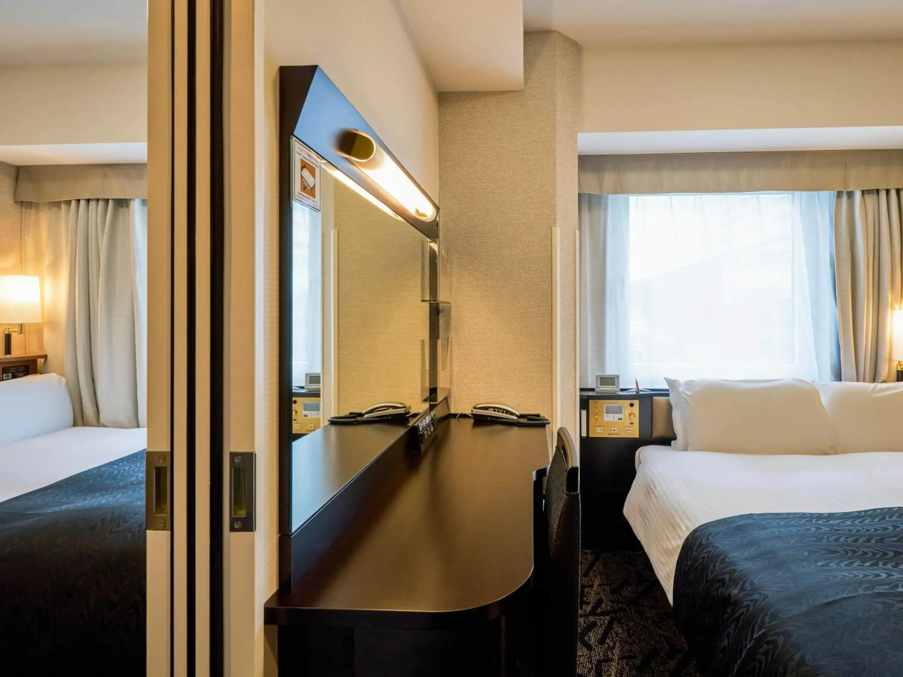 Photo of the whole room, Bed in APA Hotel Hiroshima Ekimae Shinkansenguchi Photo of the whole room, Bed in APA Hotel Hiroshima Ekimae Shinkansenguchi