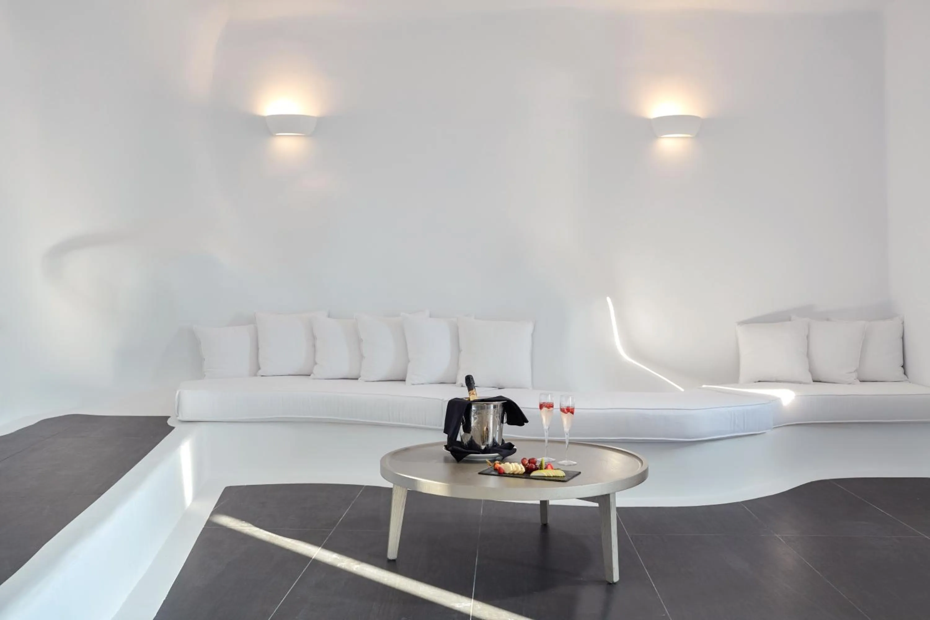 Seating area in Katikies Chromata Santorini - The Leading Hotels of the World