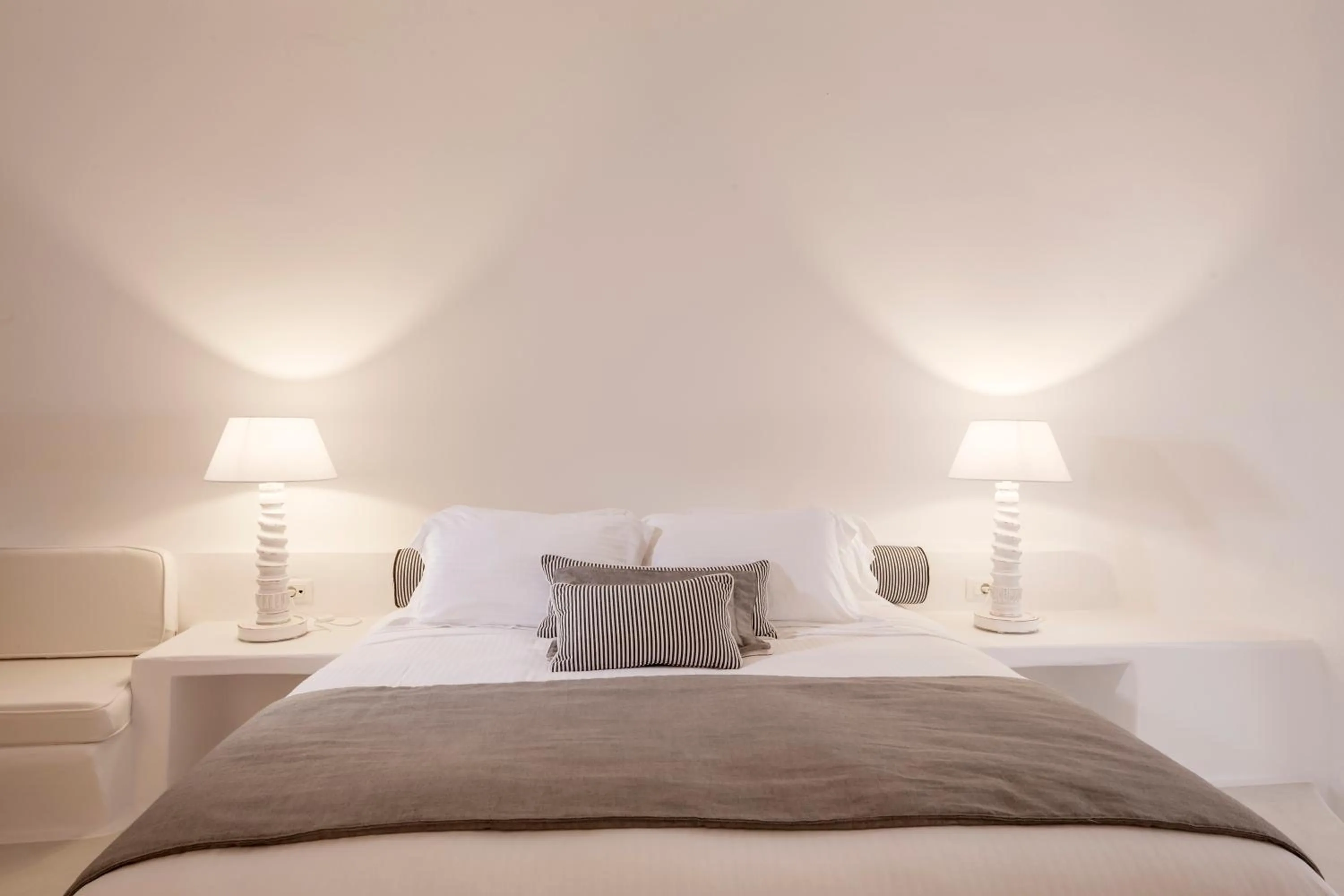 Bed in Katikies Chromata Santorini - The Leading Hotels of the World