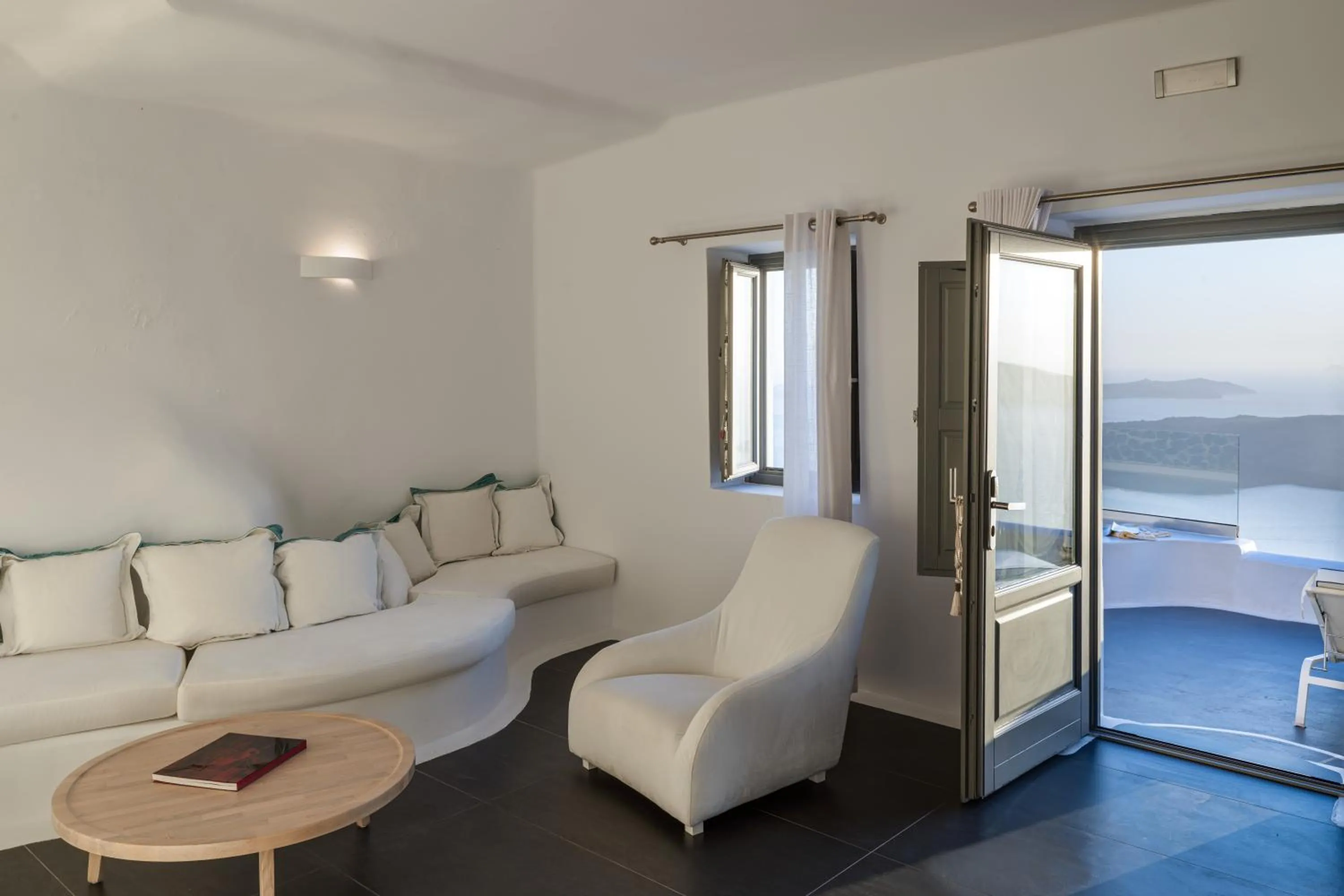 Seating area in Katikies Chromata Santorini - The Leading Hotels of the World