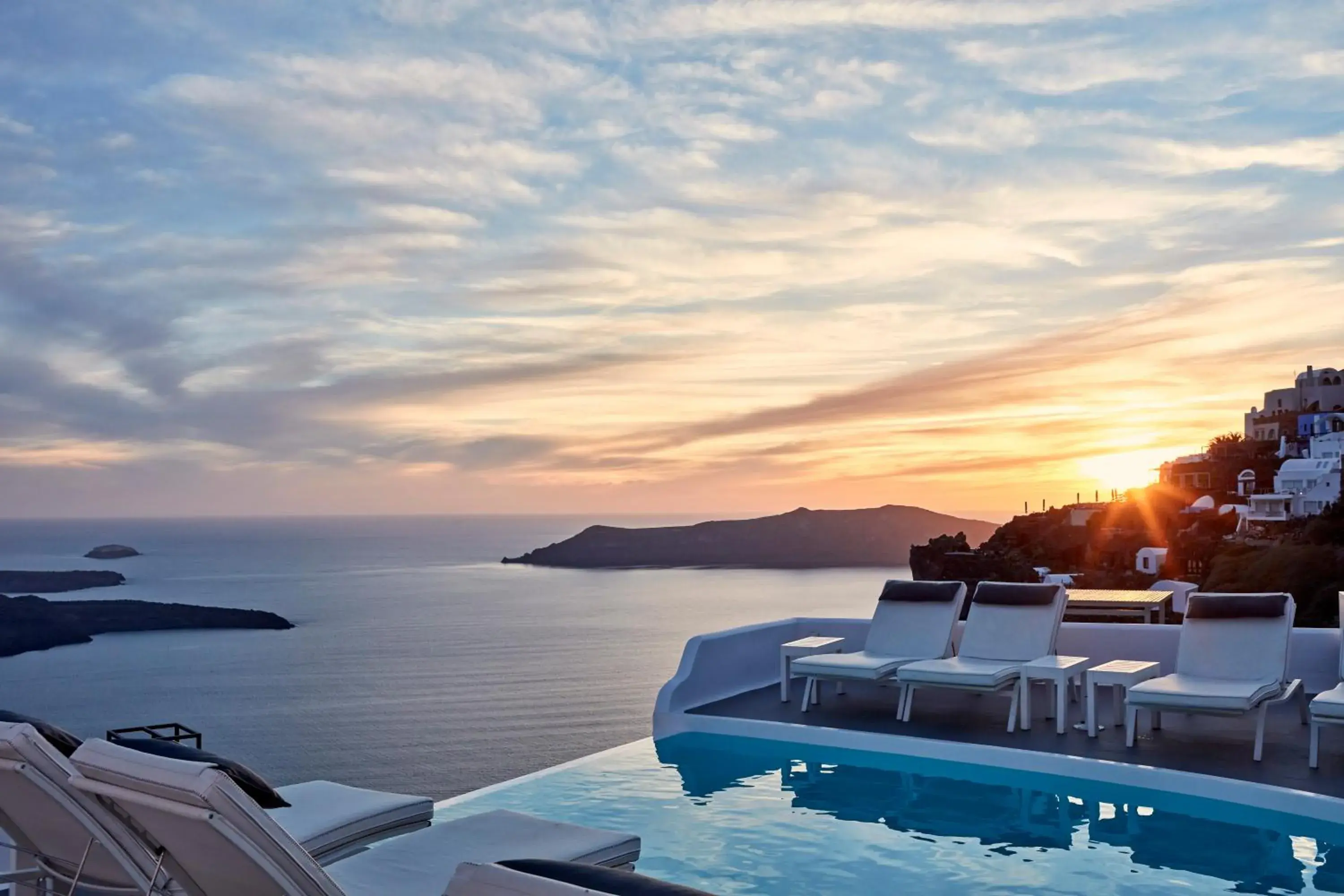 Pool view in Katikies Chromata Santorini - The Leading Hotels of the World Pool view in Katikies Chromata Santorini - The Leading Hotels of the World