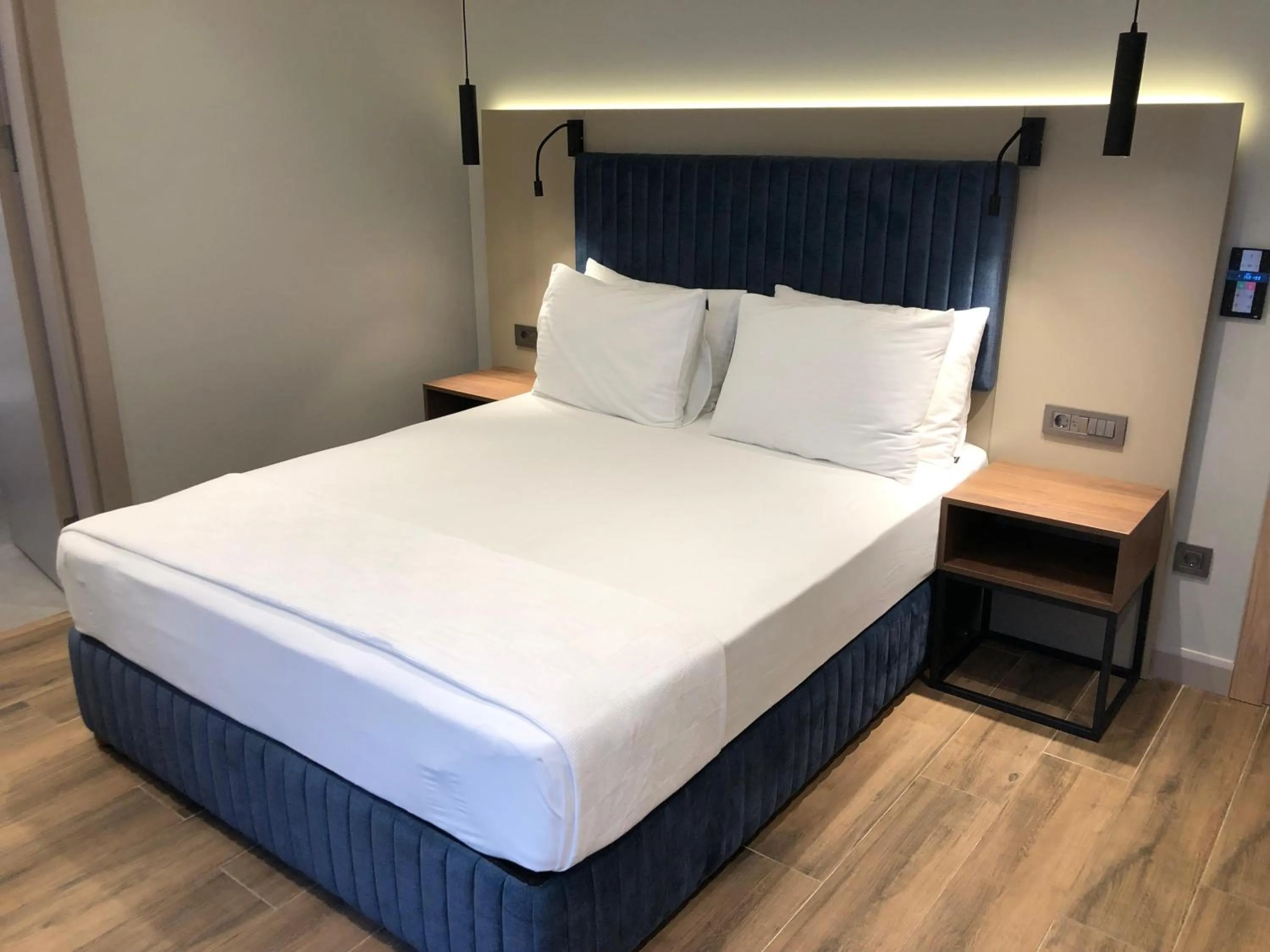 Bed in The Palm Bosphorus Hotel