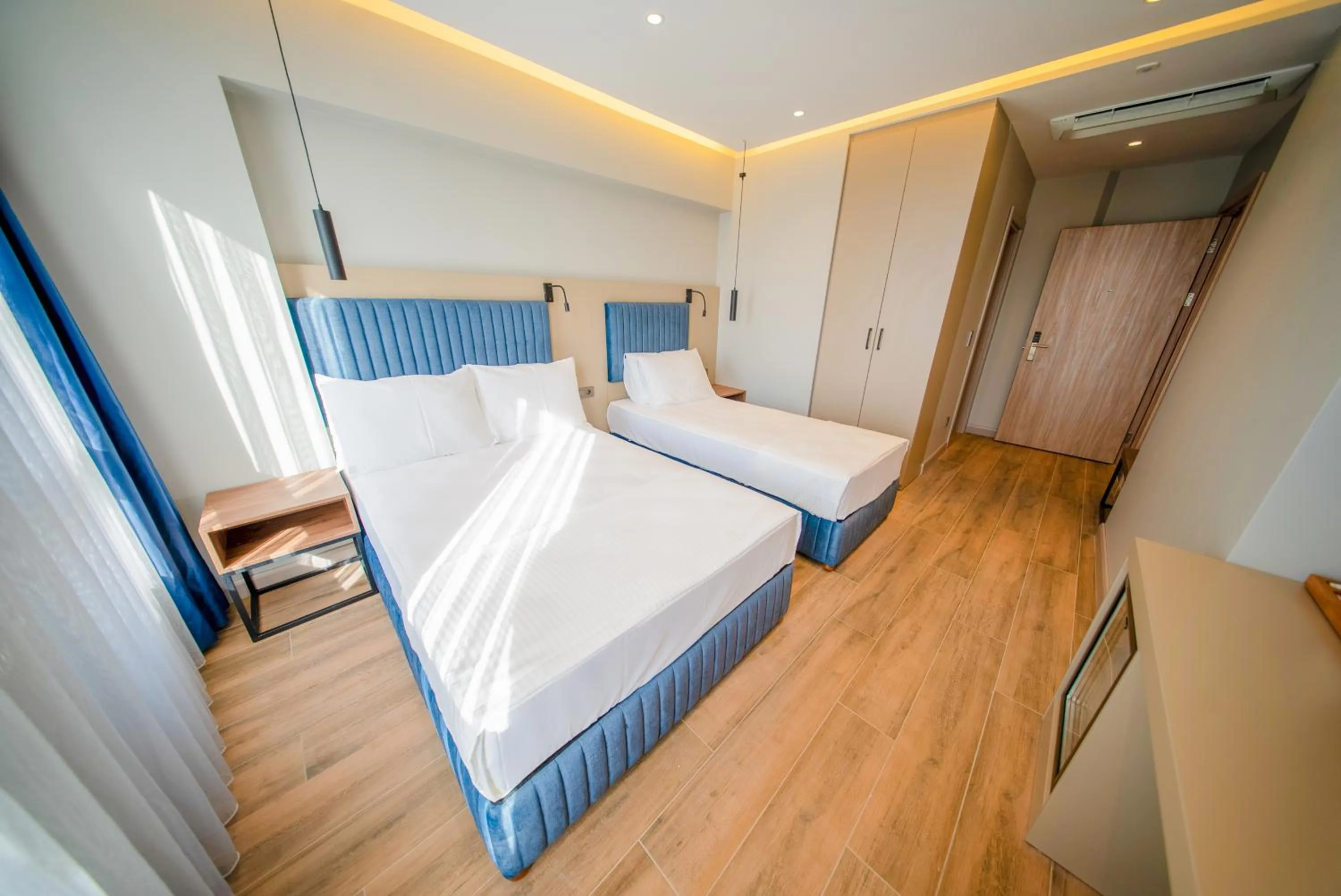 Bed in The Palm Bosphorus Hotel