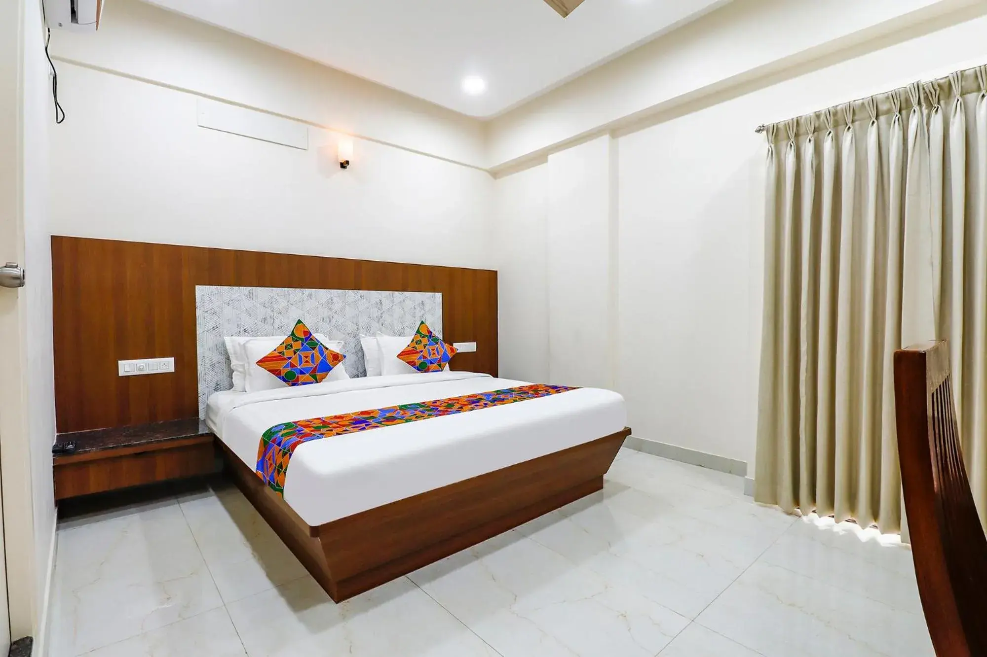 Bed in FabHotel Sathya Comforts - Nr Commercial Street Bed in FabHotel Sathya Comforts - Nr Commercial Street