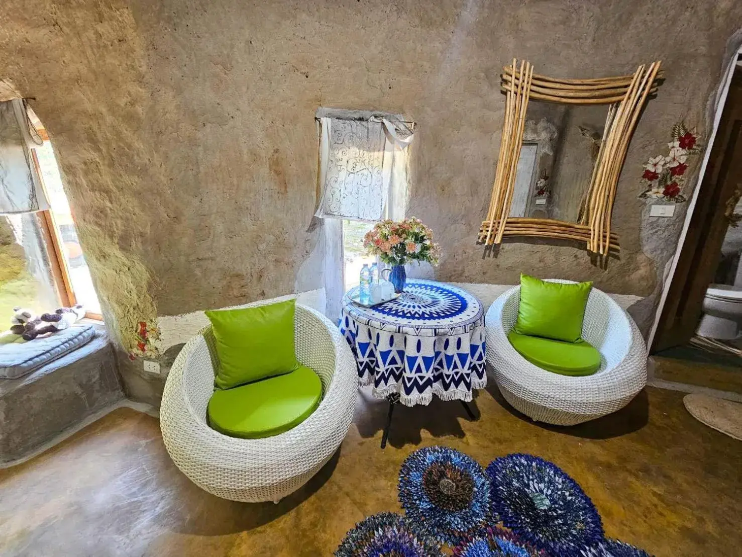 Living room in Clay House Chiang Mai By Alphatel Living room in Clay House Chiang Mai By Alphatel