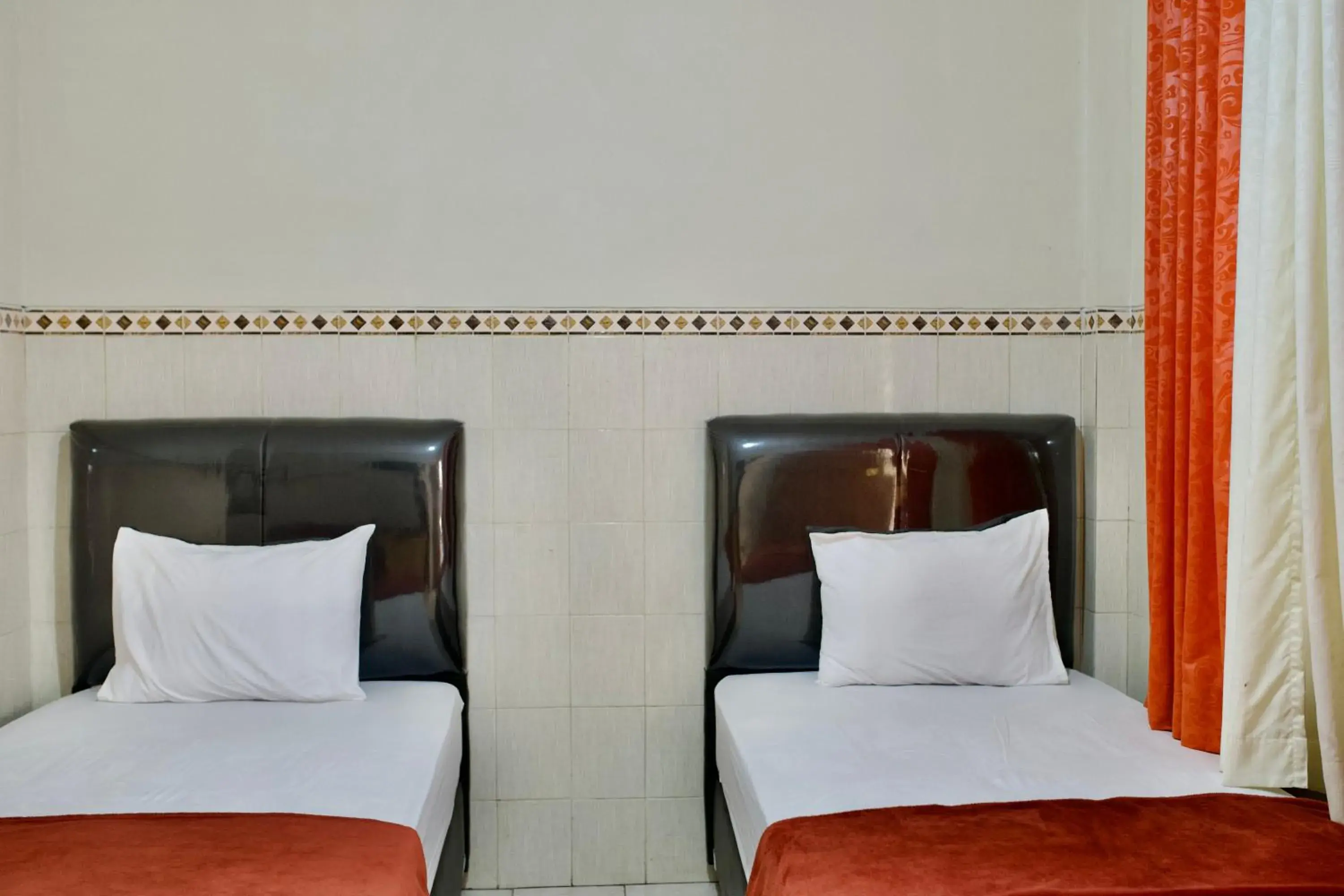 Deluxe Twin Room in Garuda Setia Hotel Deluxe Twin Room in Garuda Setia Hotel