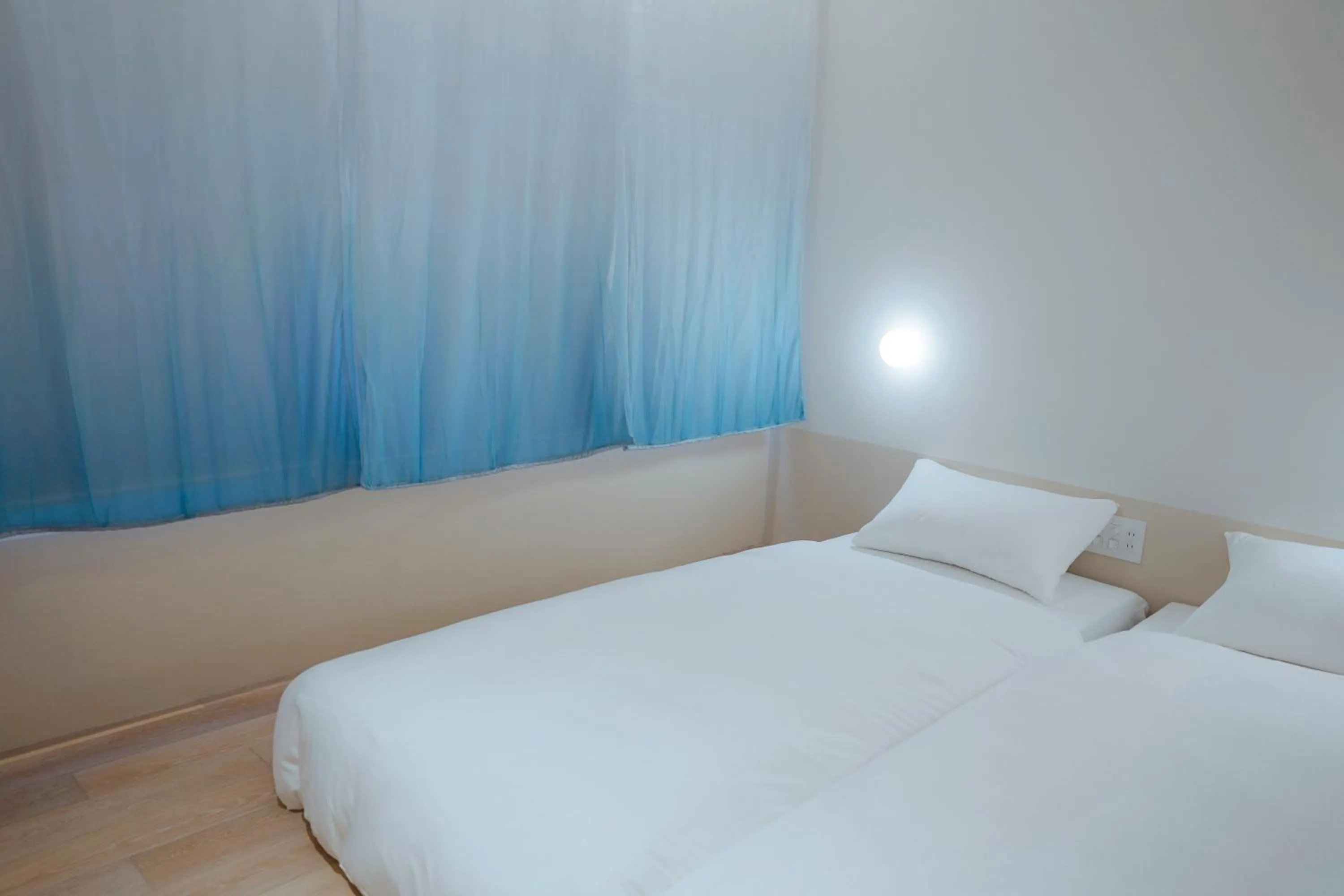 Photo of the whole room, Bed in SEKAI HOTEL Takaoka