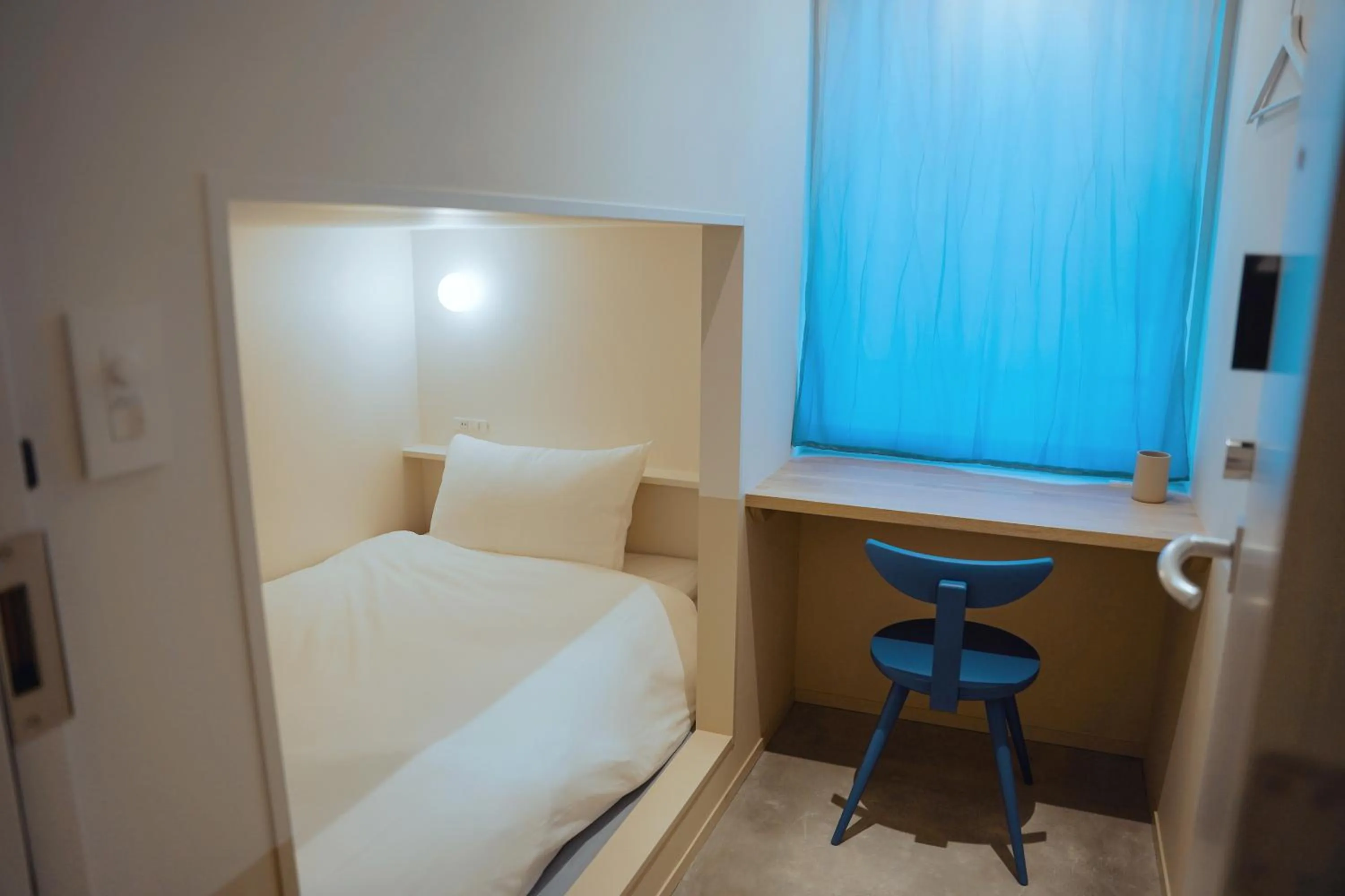 Photo of the whole room, Bed in SEKAI HOTEL Takaoka