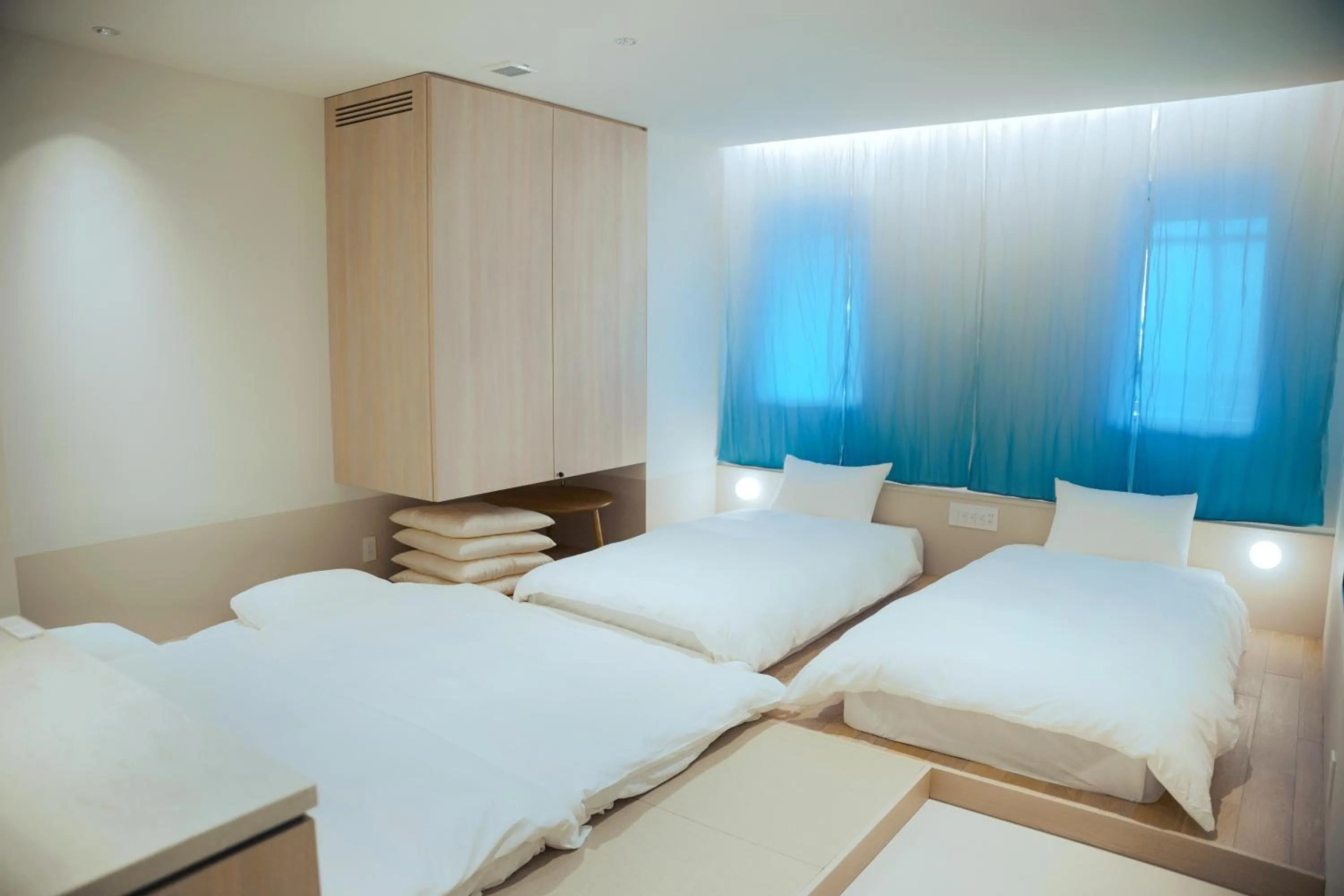 Photo of the whole room, Bed in SEKAI HOTEL Takaoka