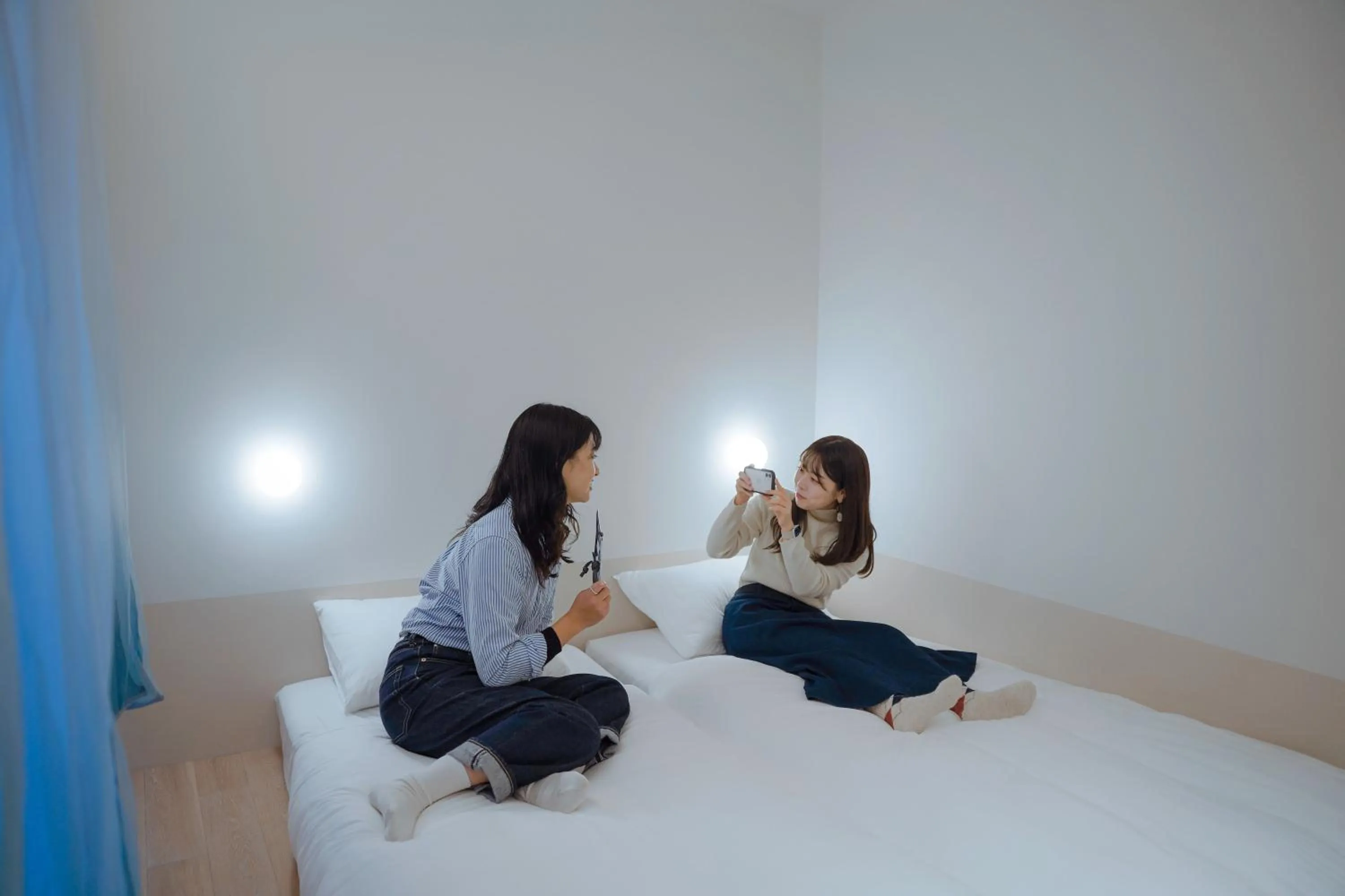 People, Bed in SEKAI HOTEL Takaoka