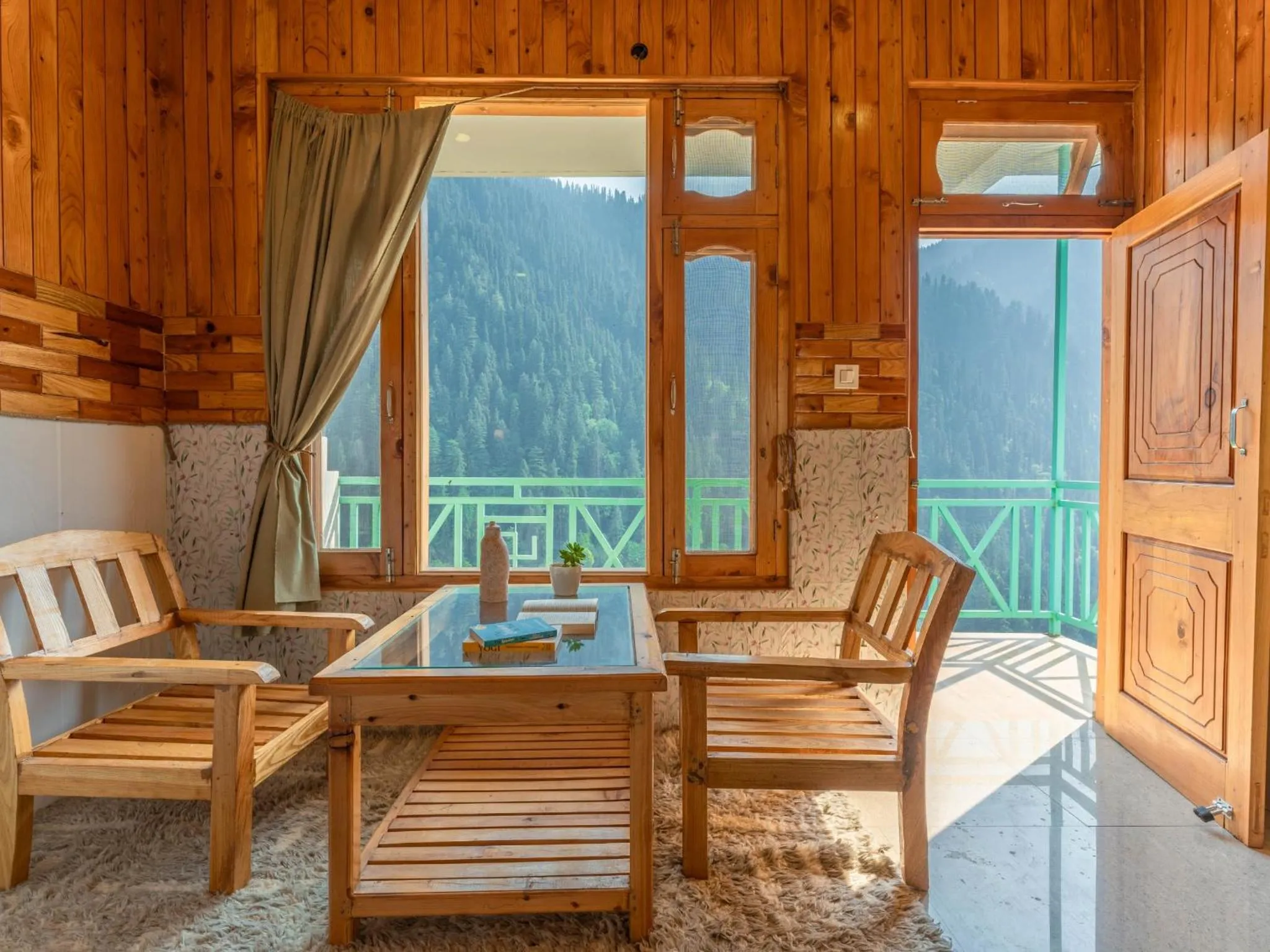 Seating area in Moustache Shoja, Jibhi