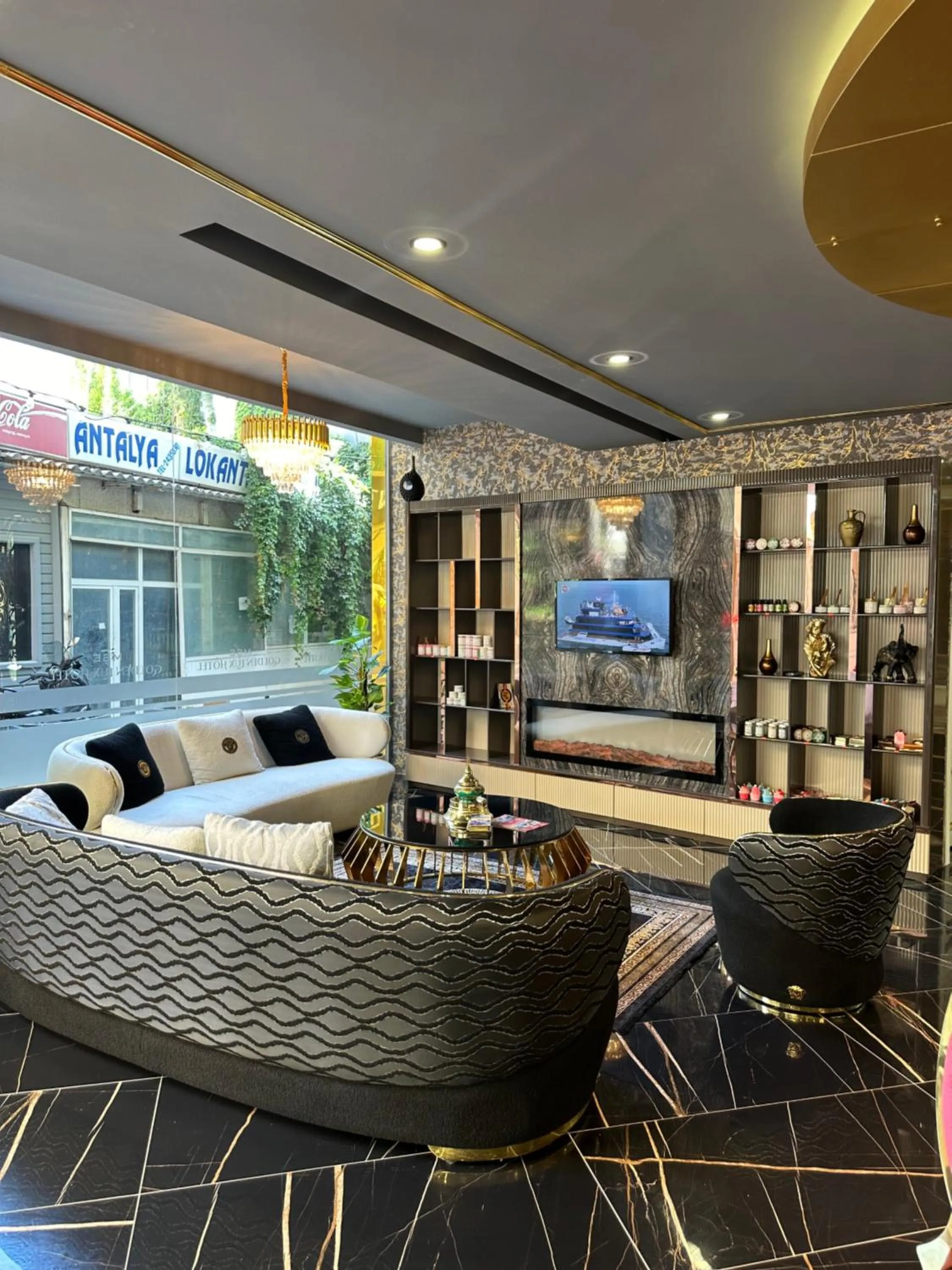 Communal lounge/ TV room in Golden Lux Hotel Antalya