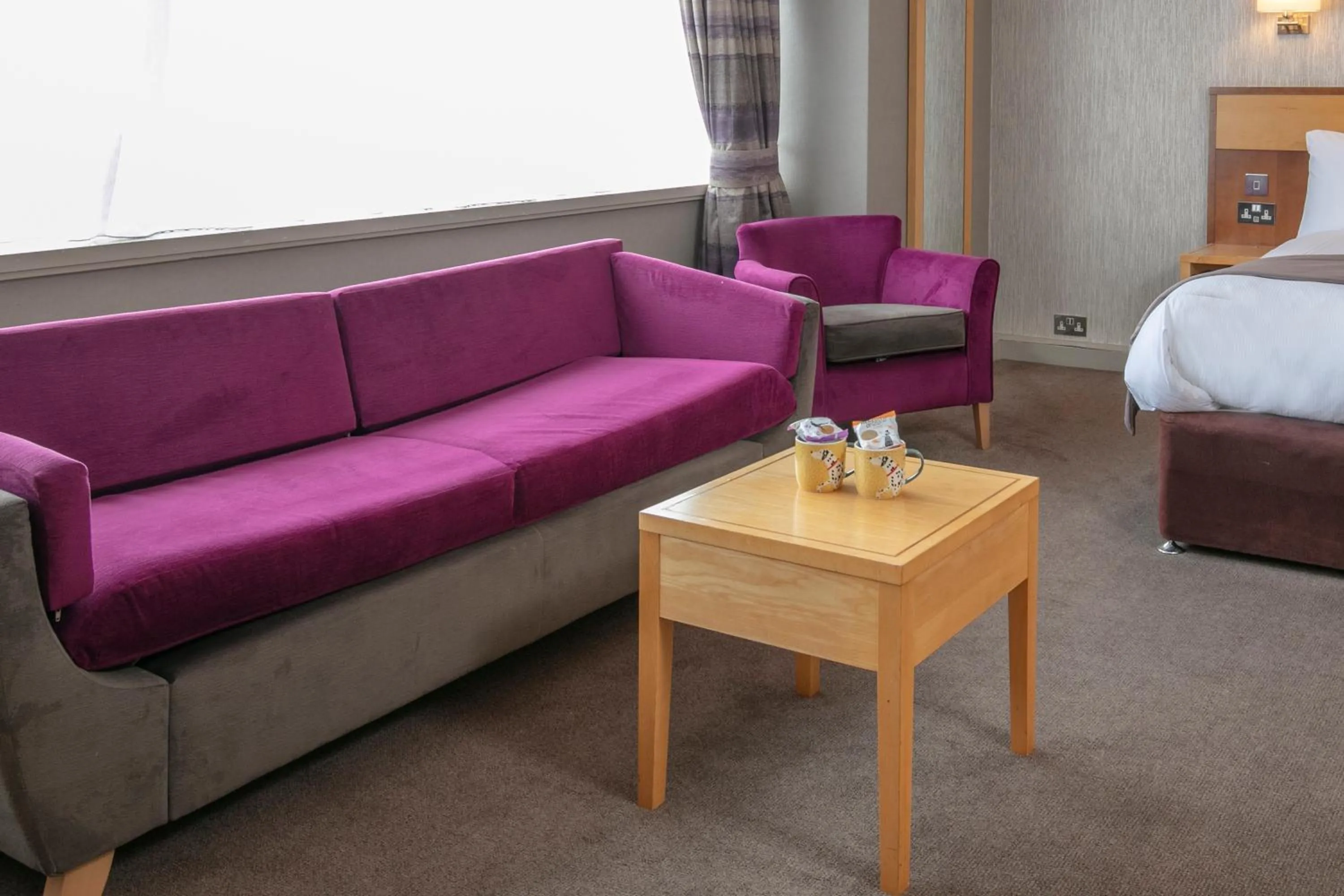 Seating area, Bed in Best Western Heath Court Hotel