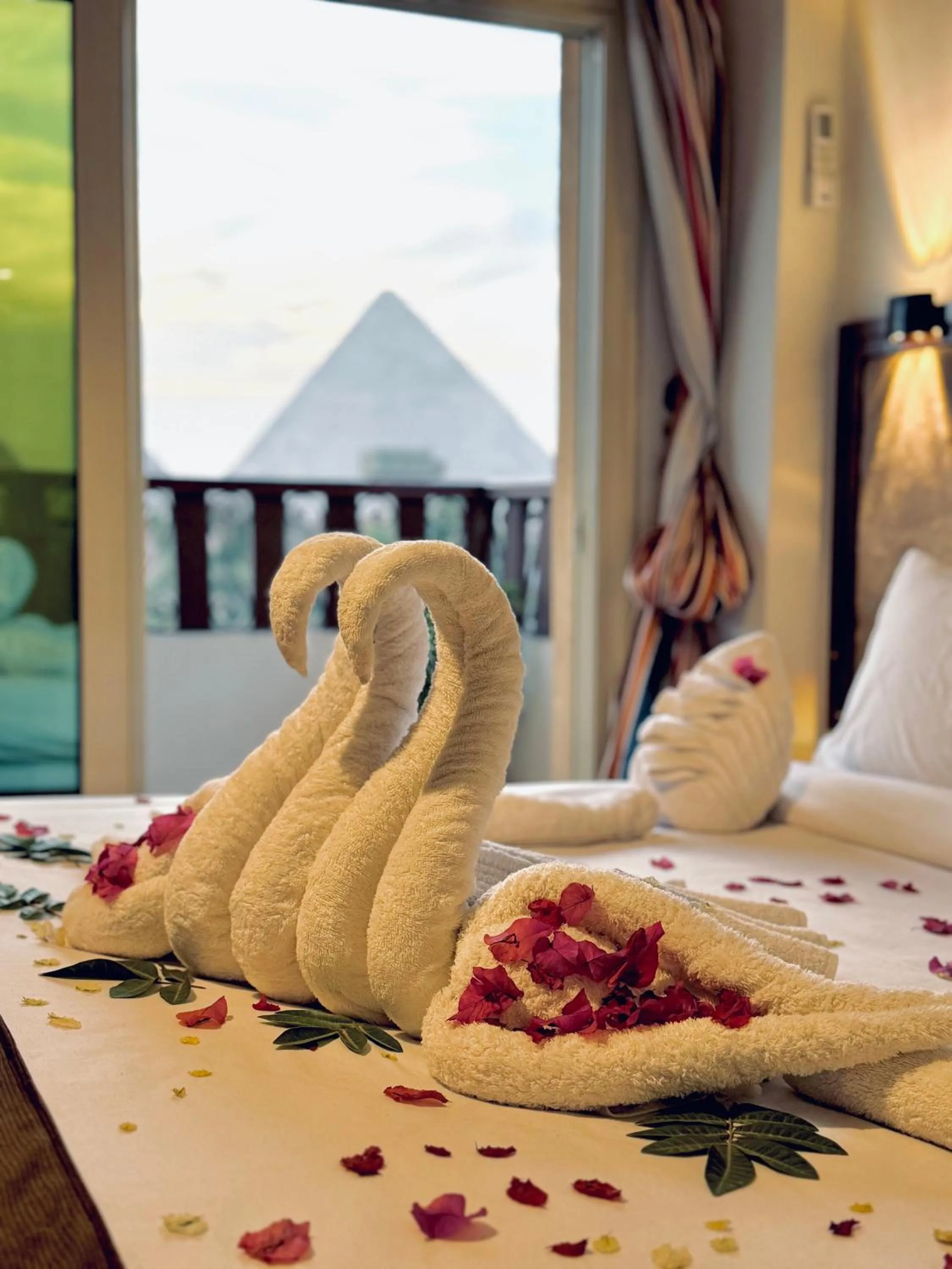 Bed in Flower Pyramids Inn