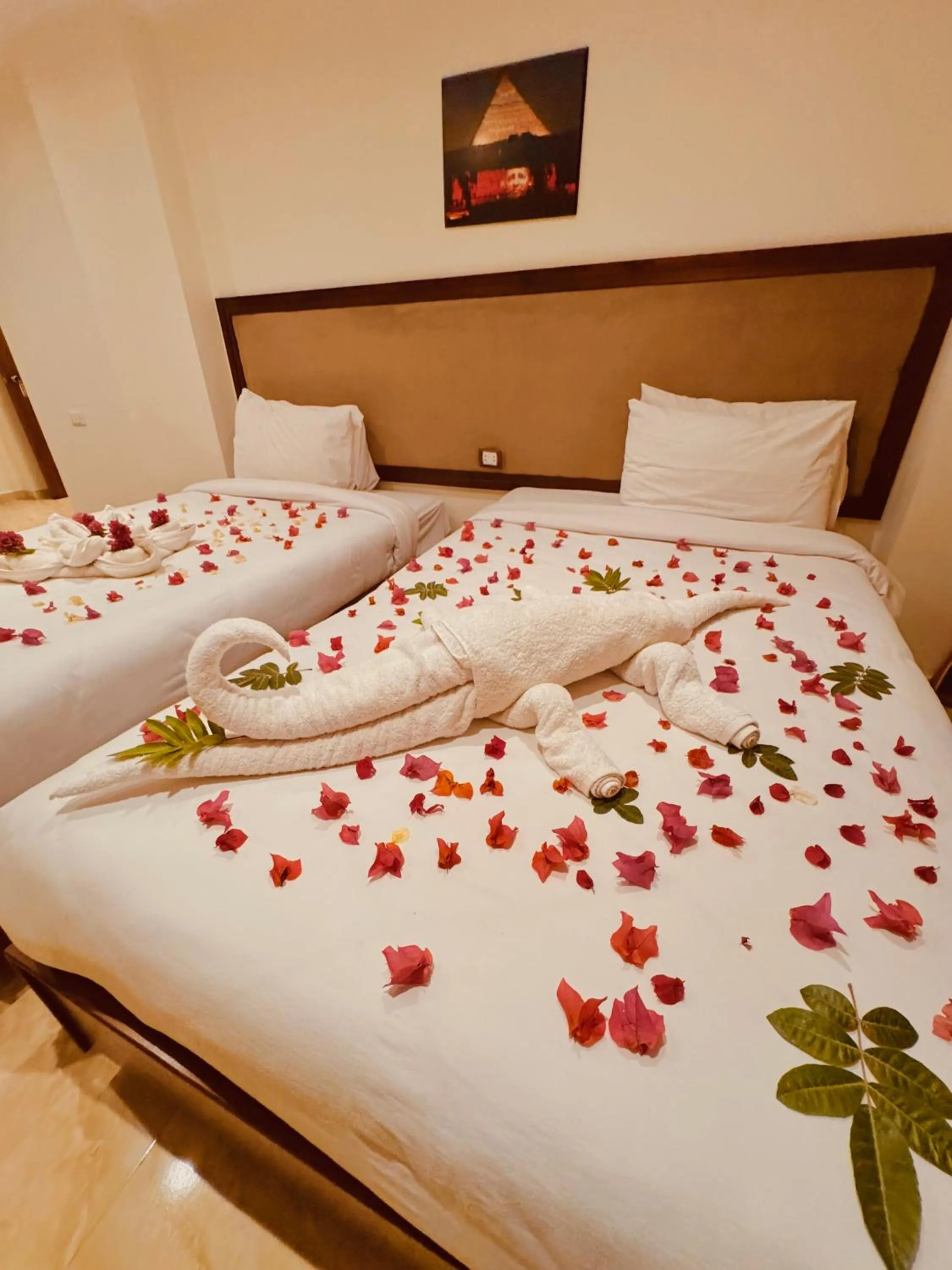Bed in Flower Pyramids Inn