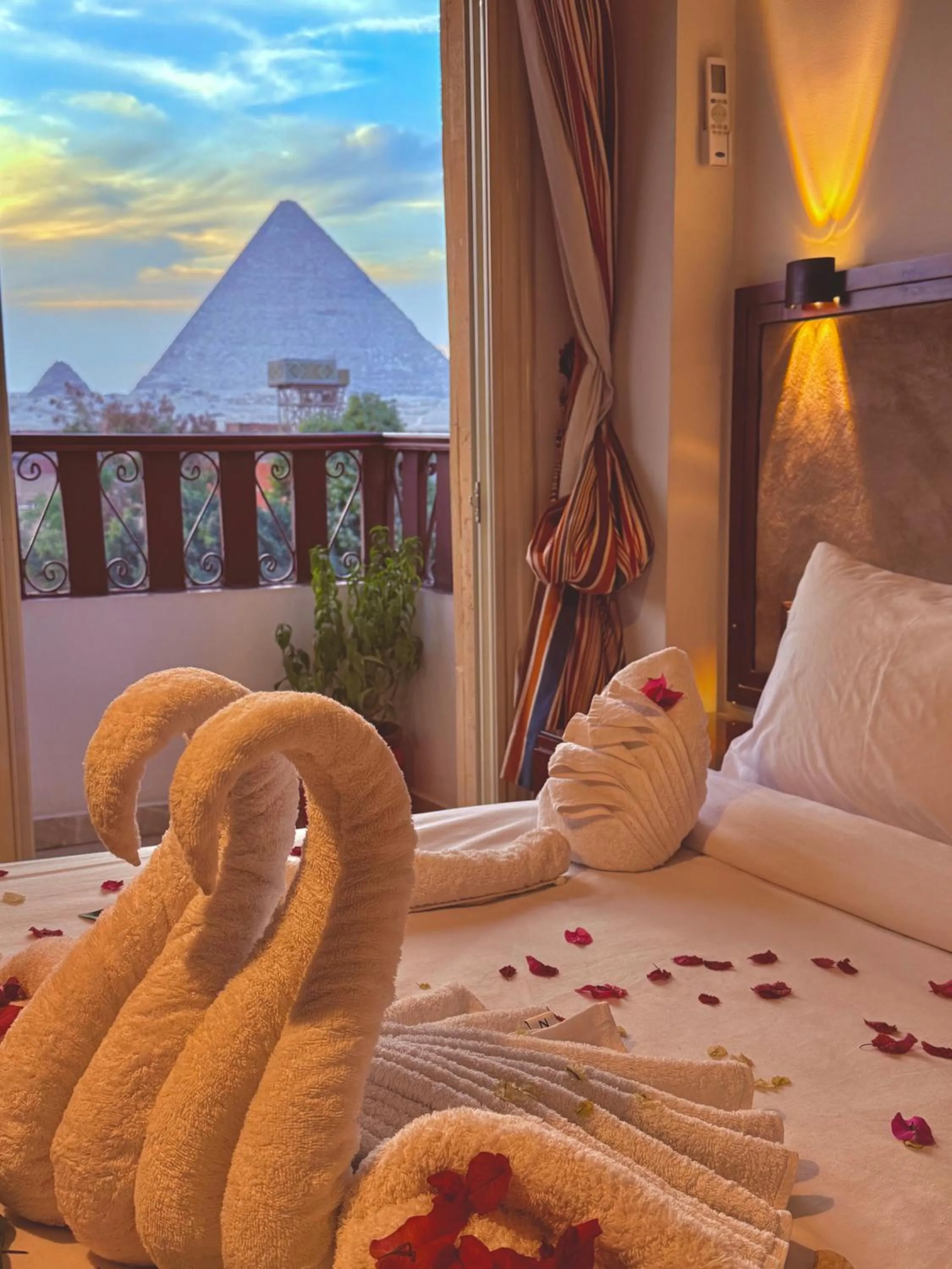 View (from property/room), Bed in Flower Pyramids Inn