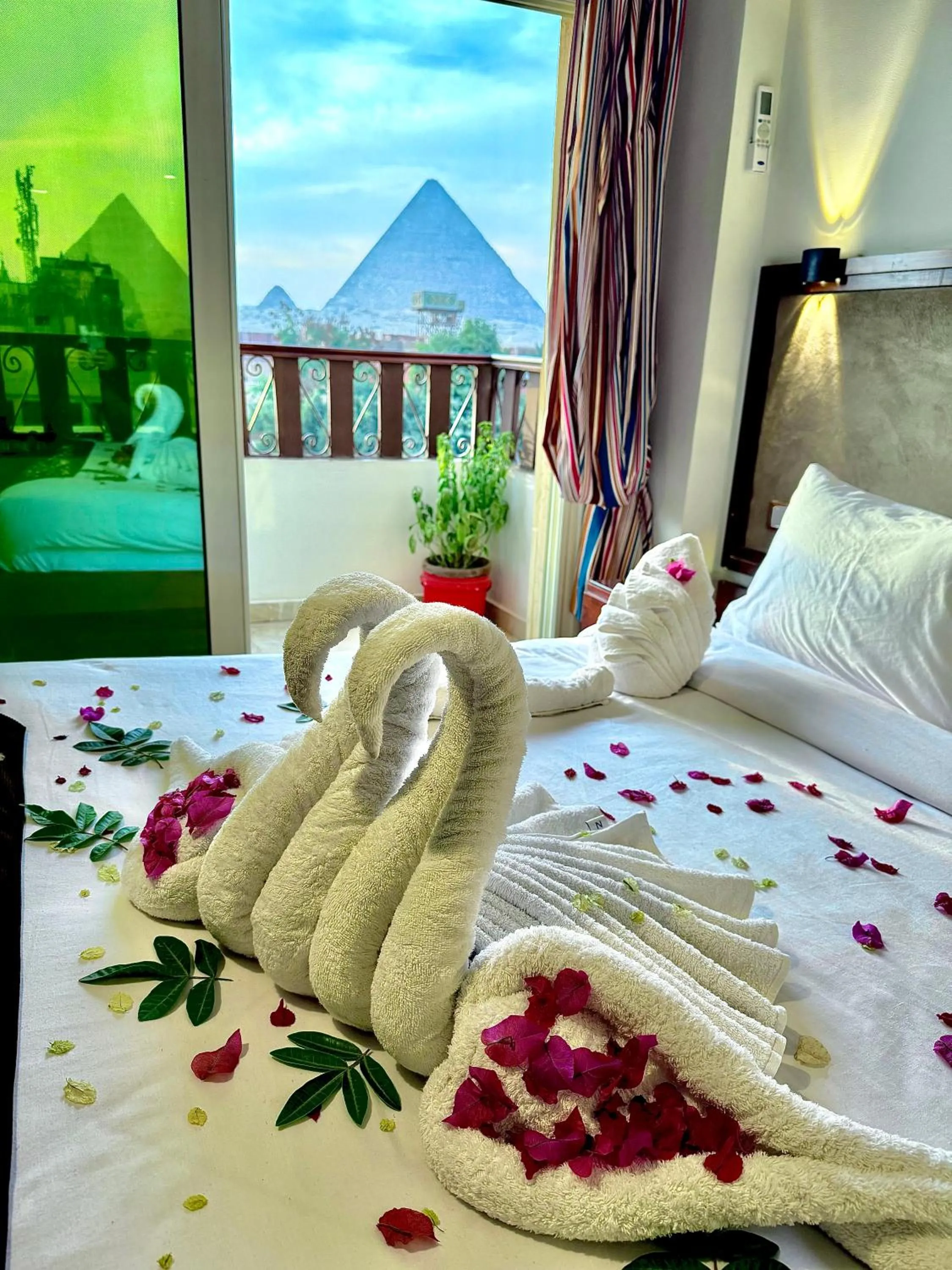 Photo of the whole room, Bed in Flower Pyramids Inn