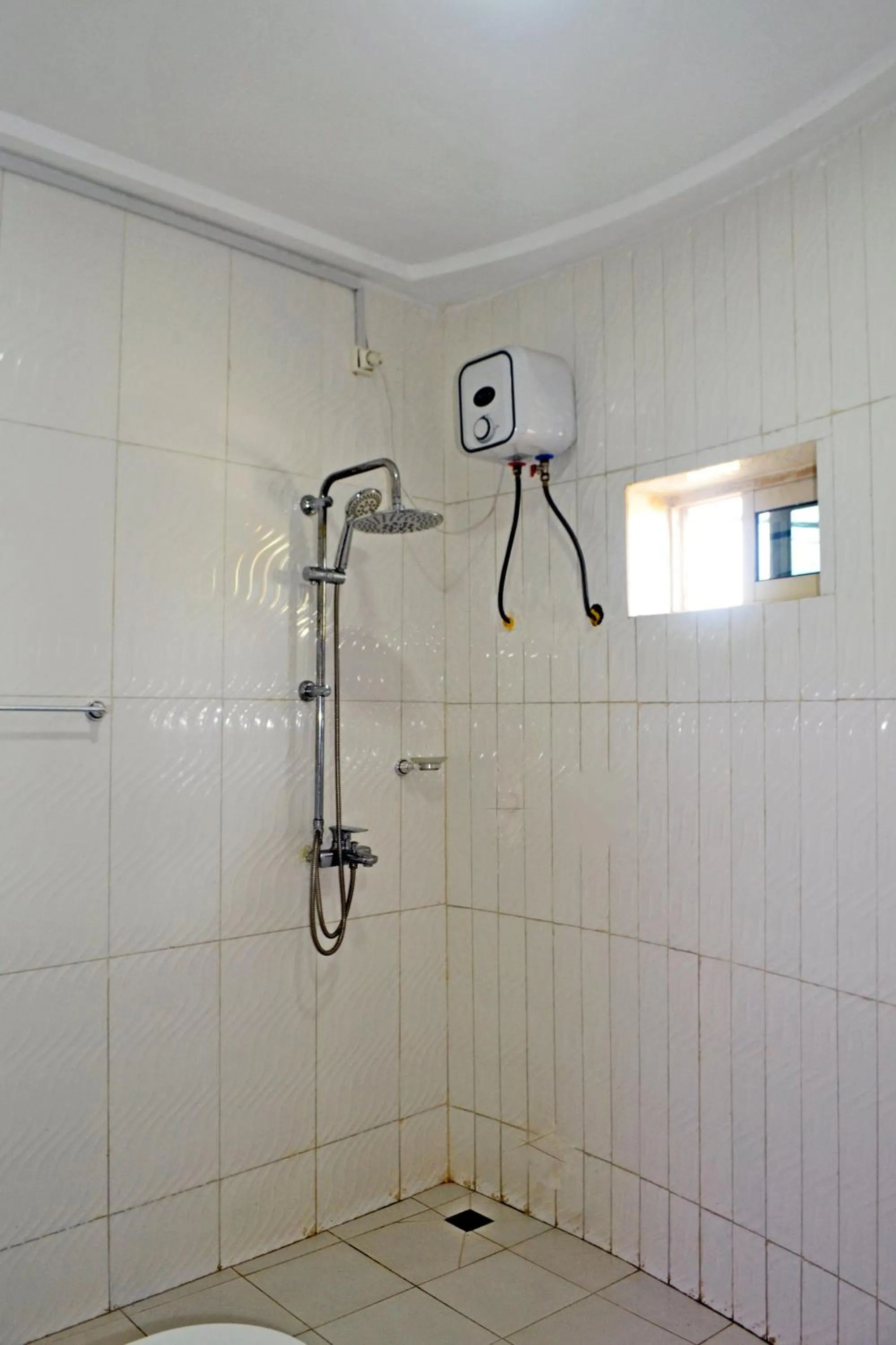Shower in Beach Sand Hotel & Resort, Cotonou