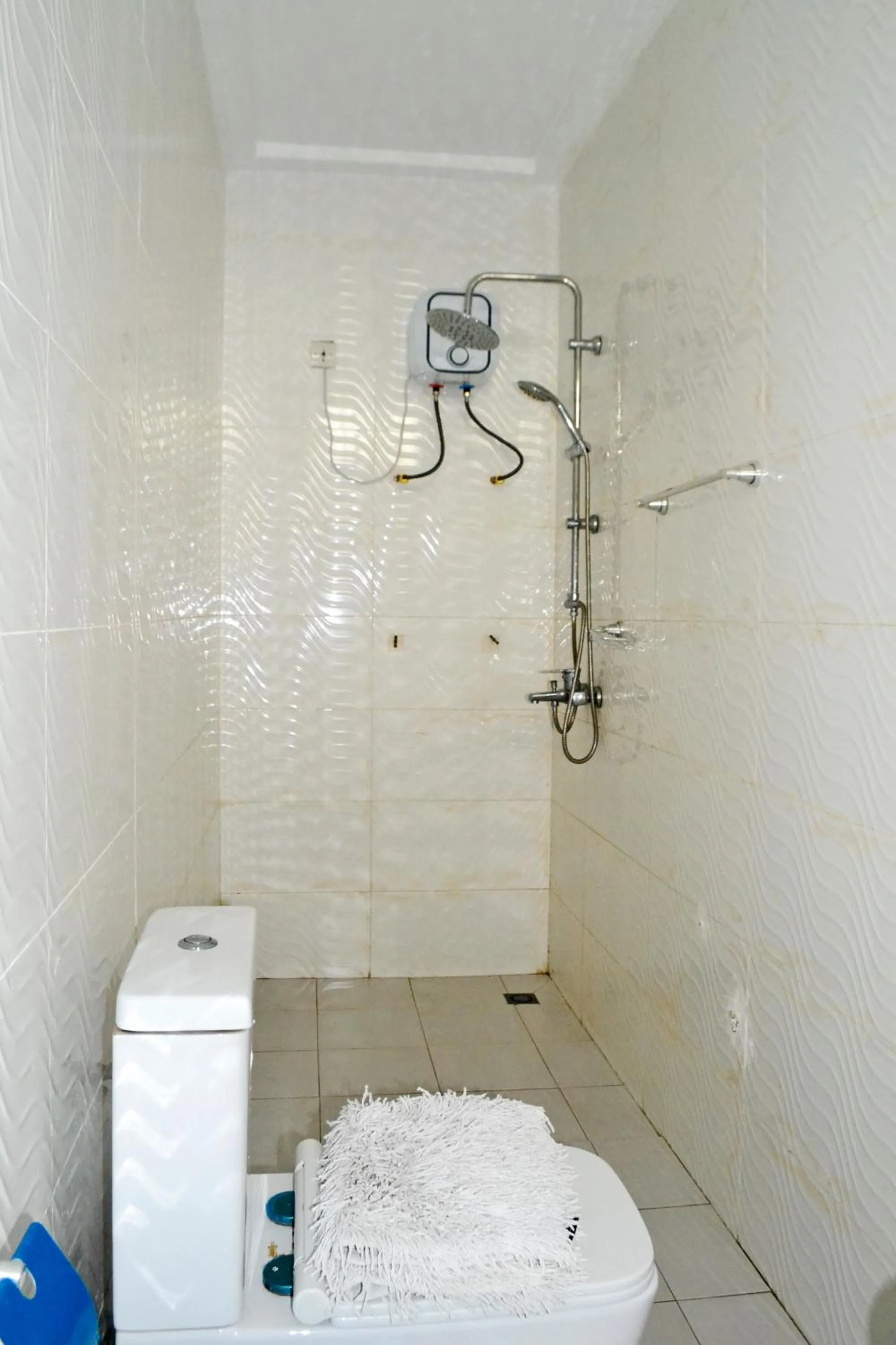 Shower in Beach Sand Hotel & Resort, Cotonou