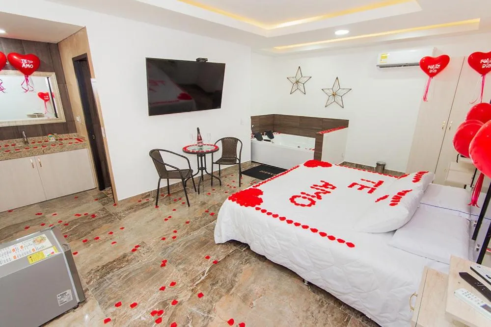 Communal lounge/ TV room, Bed in Hotel deluxe oasis de la colina boutique