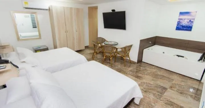 Communal lounge/ TV room, Bed in Hotel deluxe oasis de la colina boutique