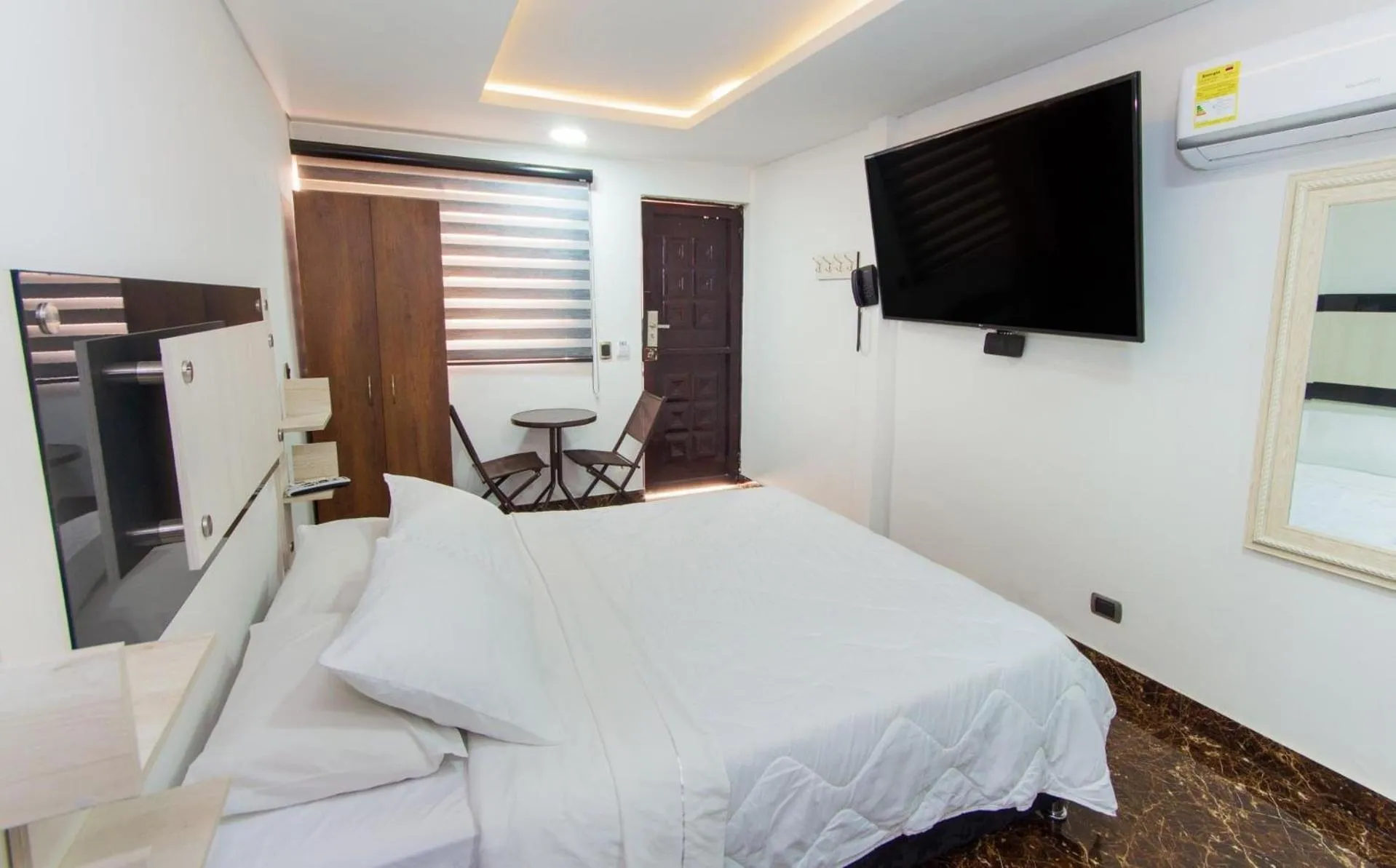 Communal lounge/ TV room, Bed in Hotel deluxe oasis de la colina boutique