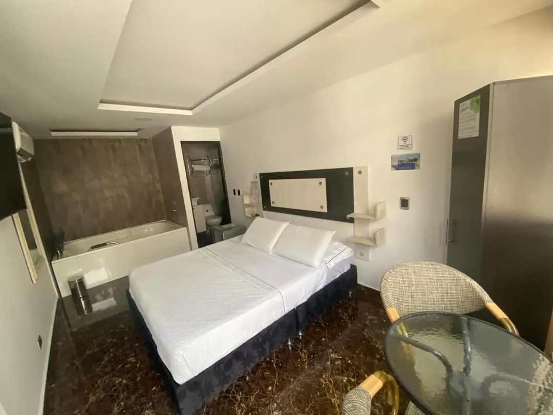 Bed in Hotel deluxe oasis de la colina boutique