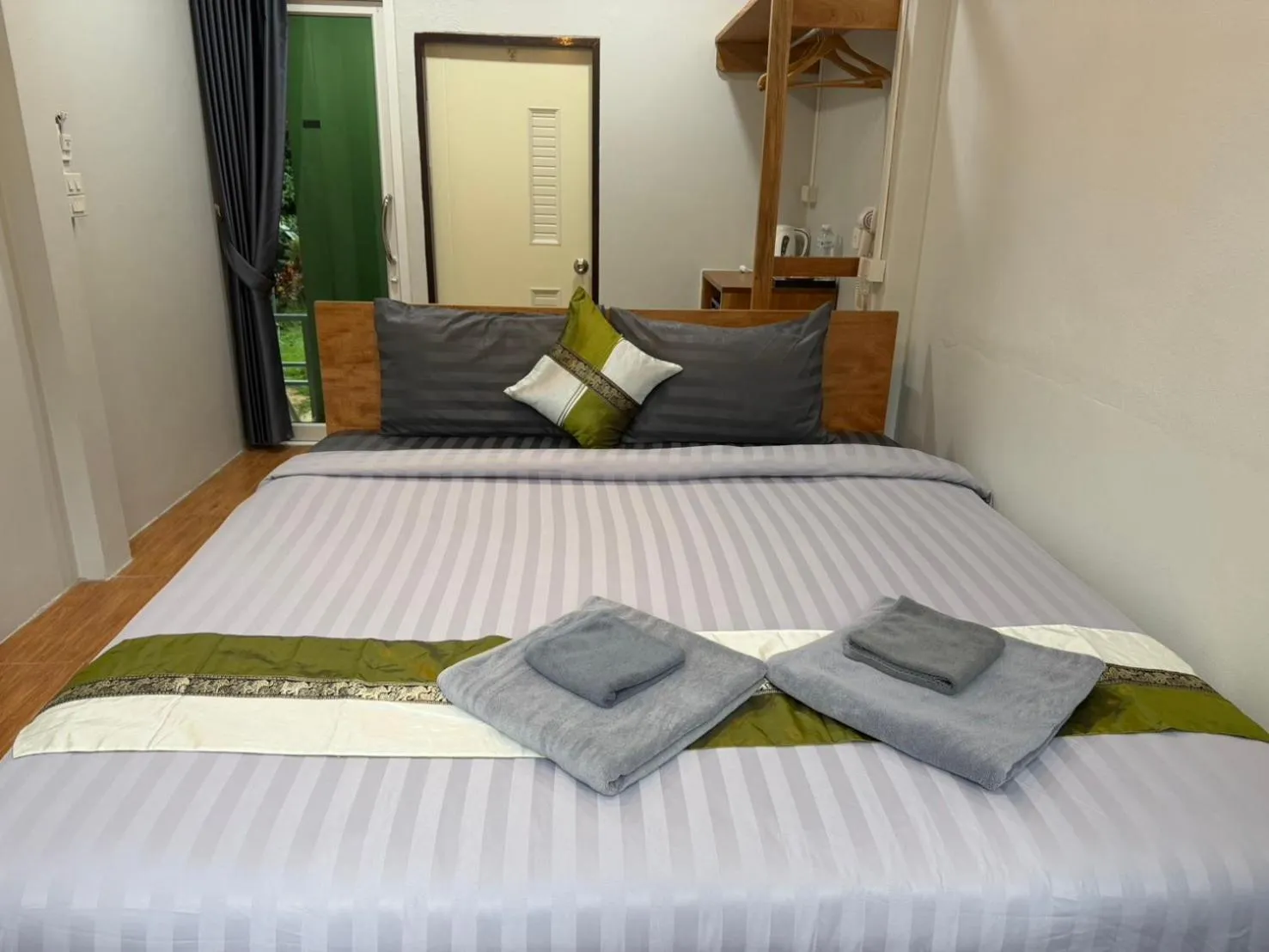 Property building, Bed in Khao Sok Jungle Huts Resort