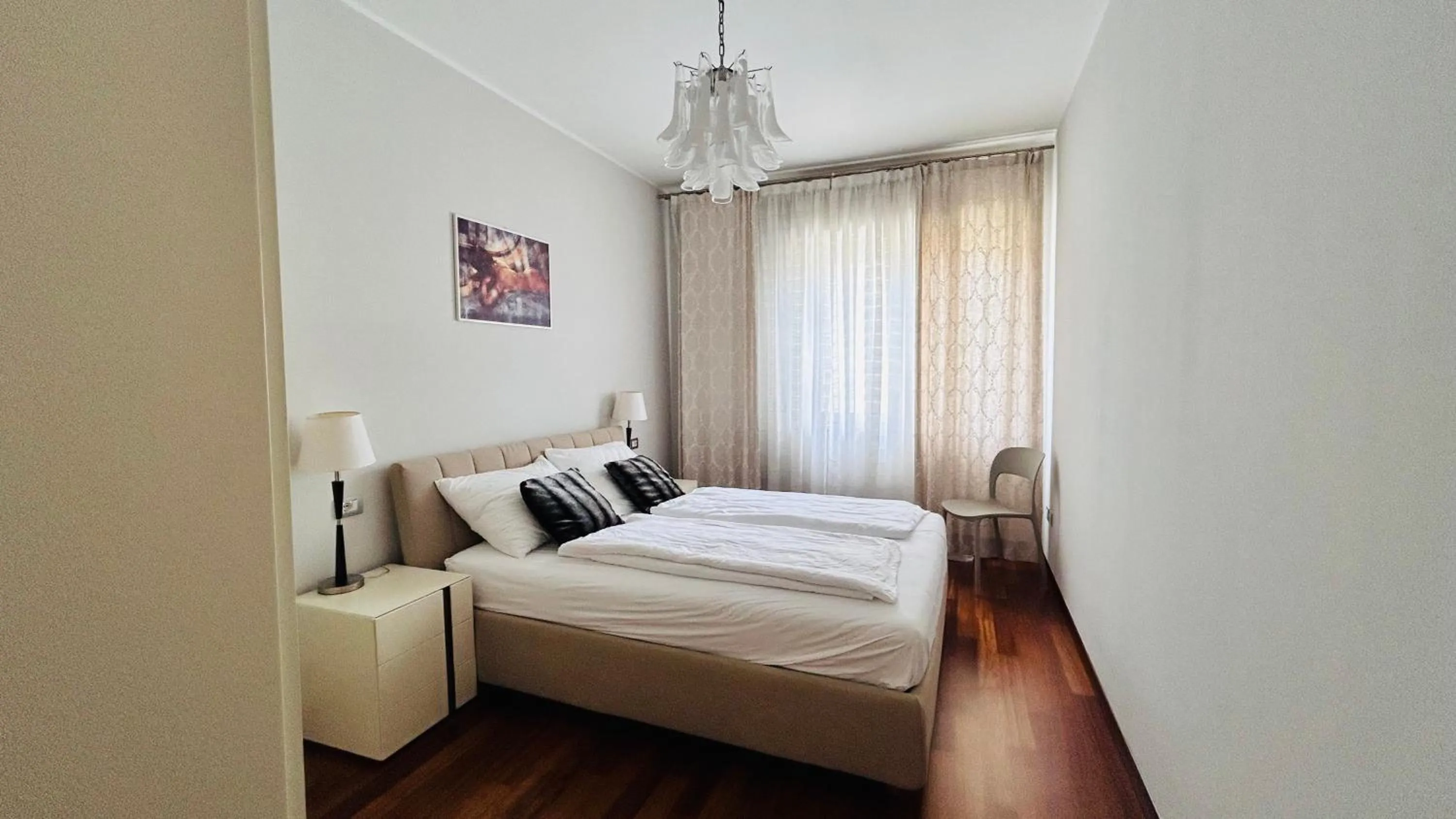 Bed in Lakeview Verdi Apartment