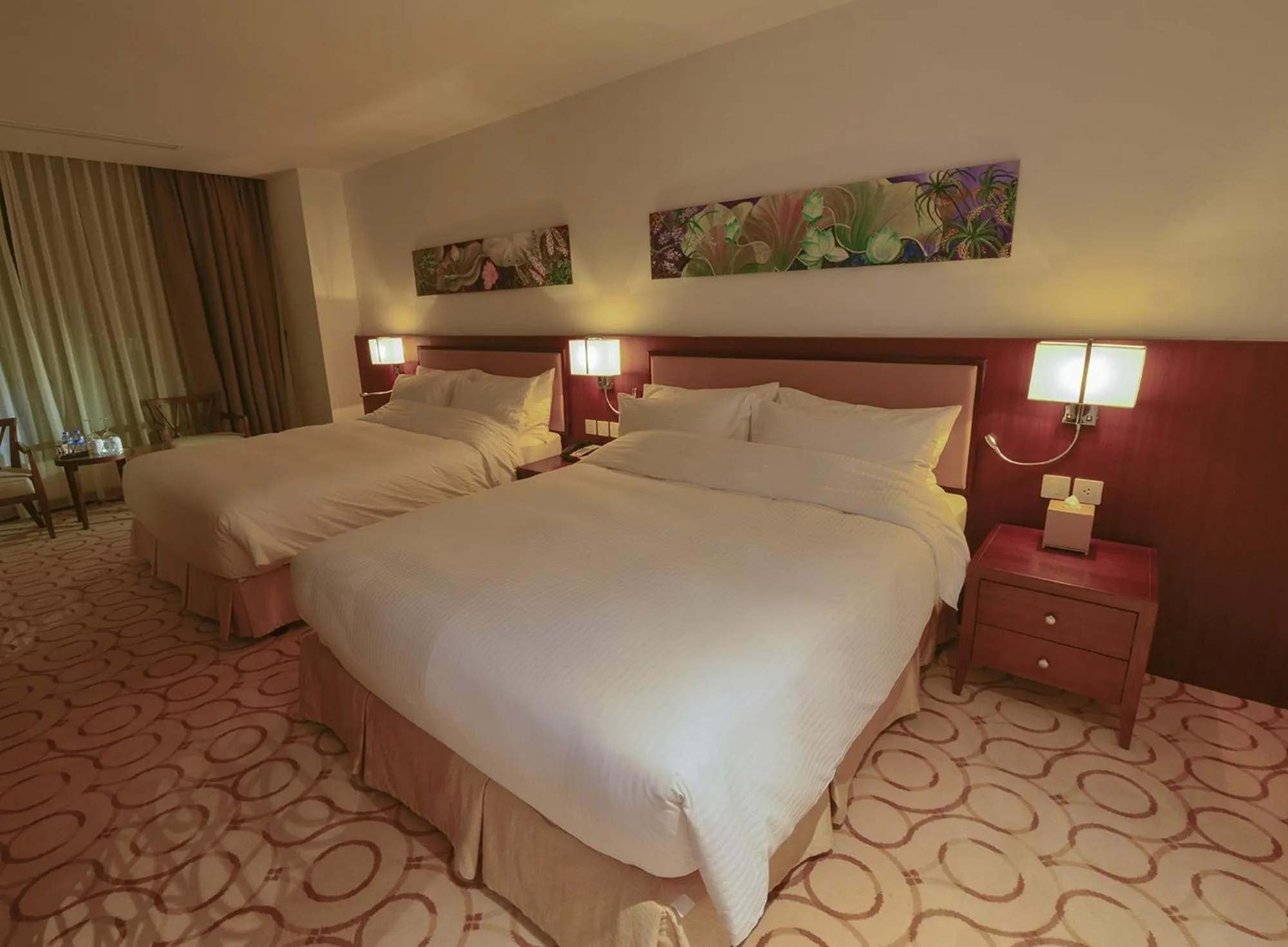 Bed in Aristo International Hotel
