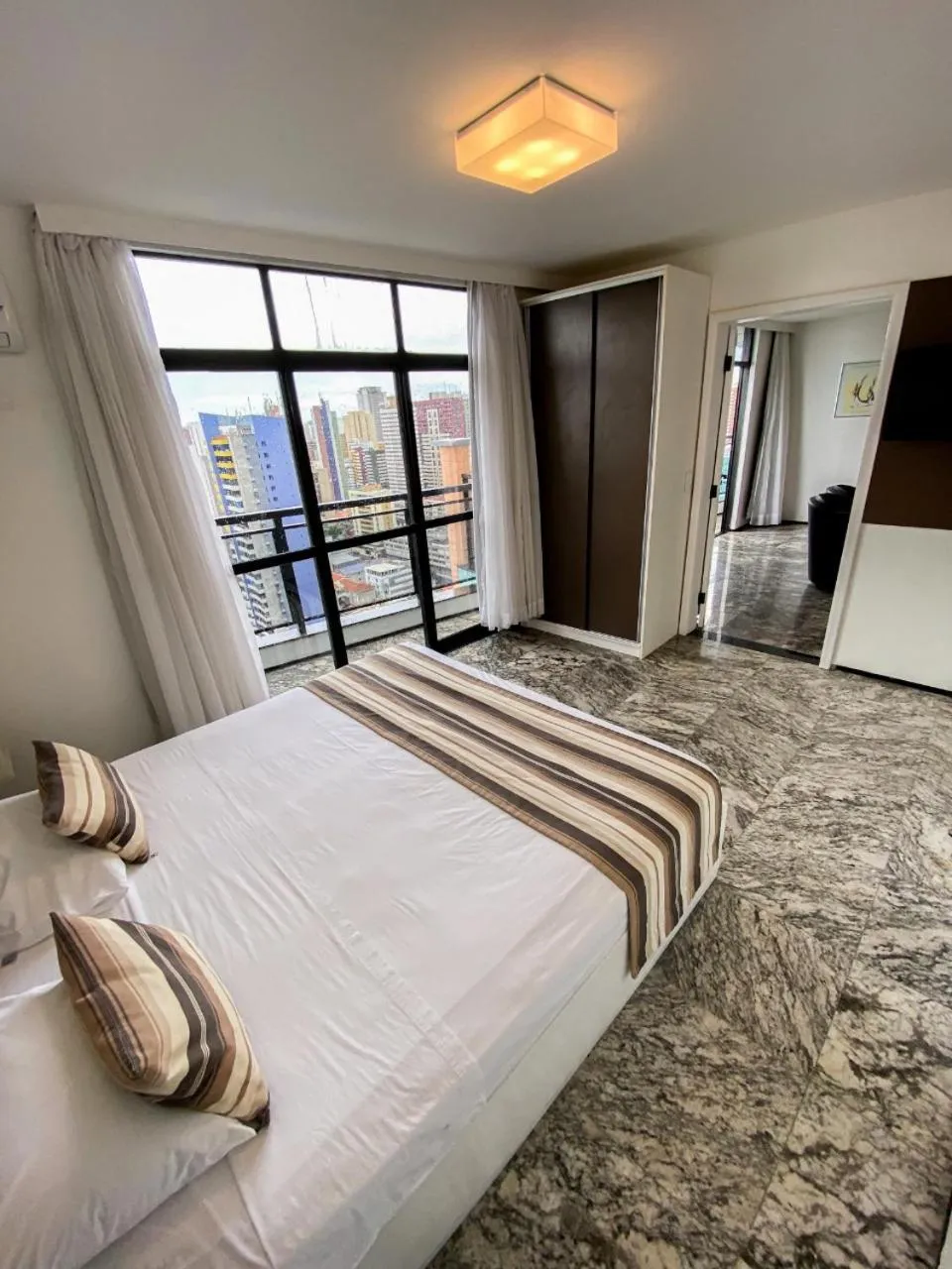 View (from property/room), Bed in Hotel Brasil Tropical