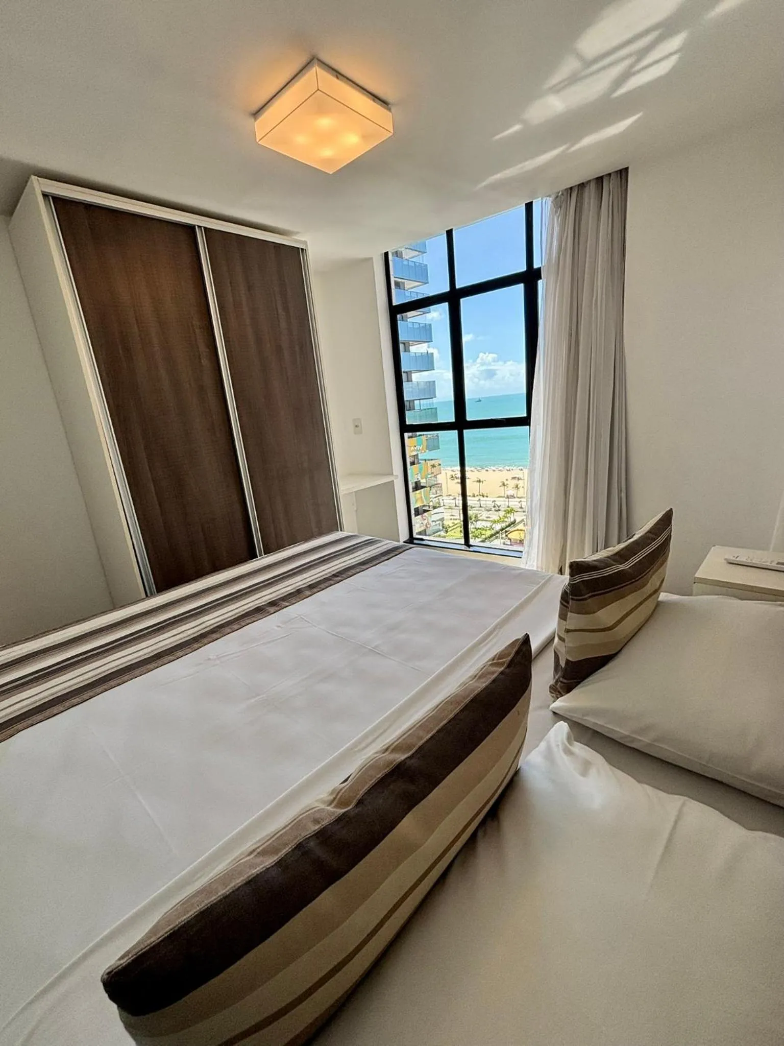 View (from property/room), Bed in Hotel Brasil Tropical