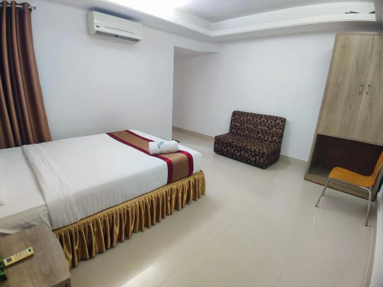 Bed in Cox West Inn
