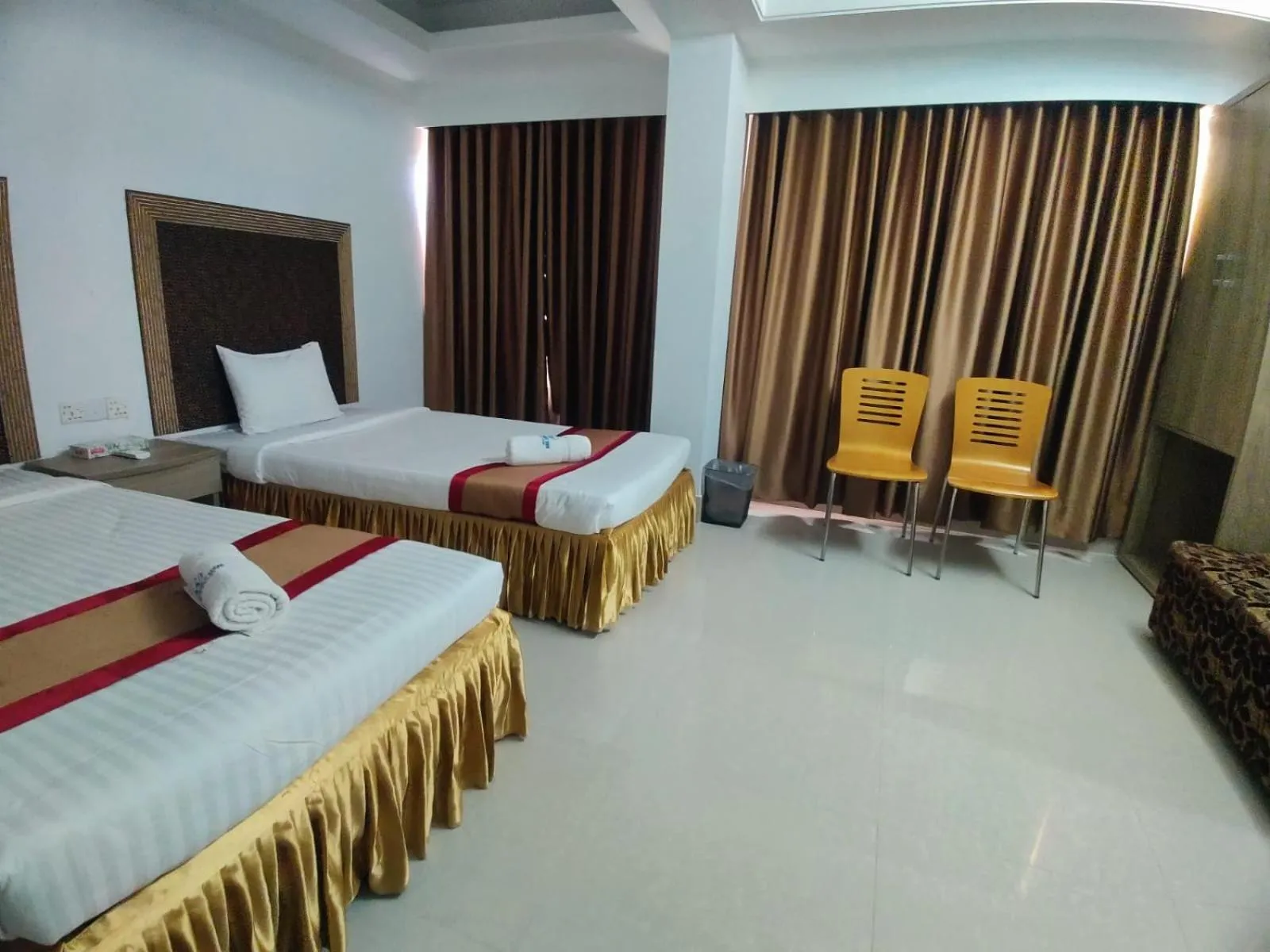 Bed in Cox West Inn